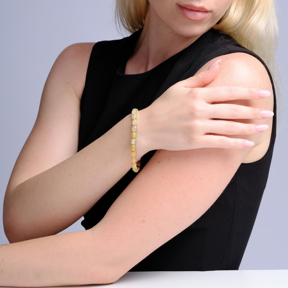 Fiery 20 Carat Opal Tennis Bracelet 14 Karat Yellow Gold