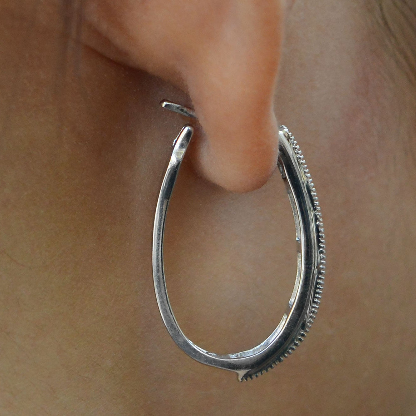 Contemporary .80 Carat Diamond Oval Hoop Earrings