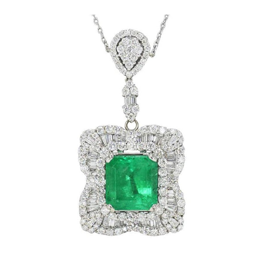 A contemporary emerald & diamond ballerina setting pendant necklace.