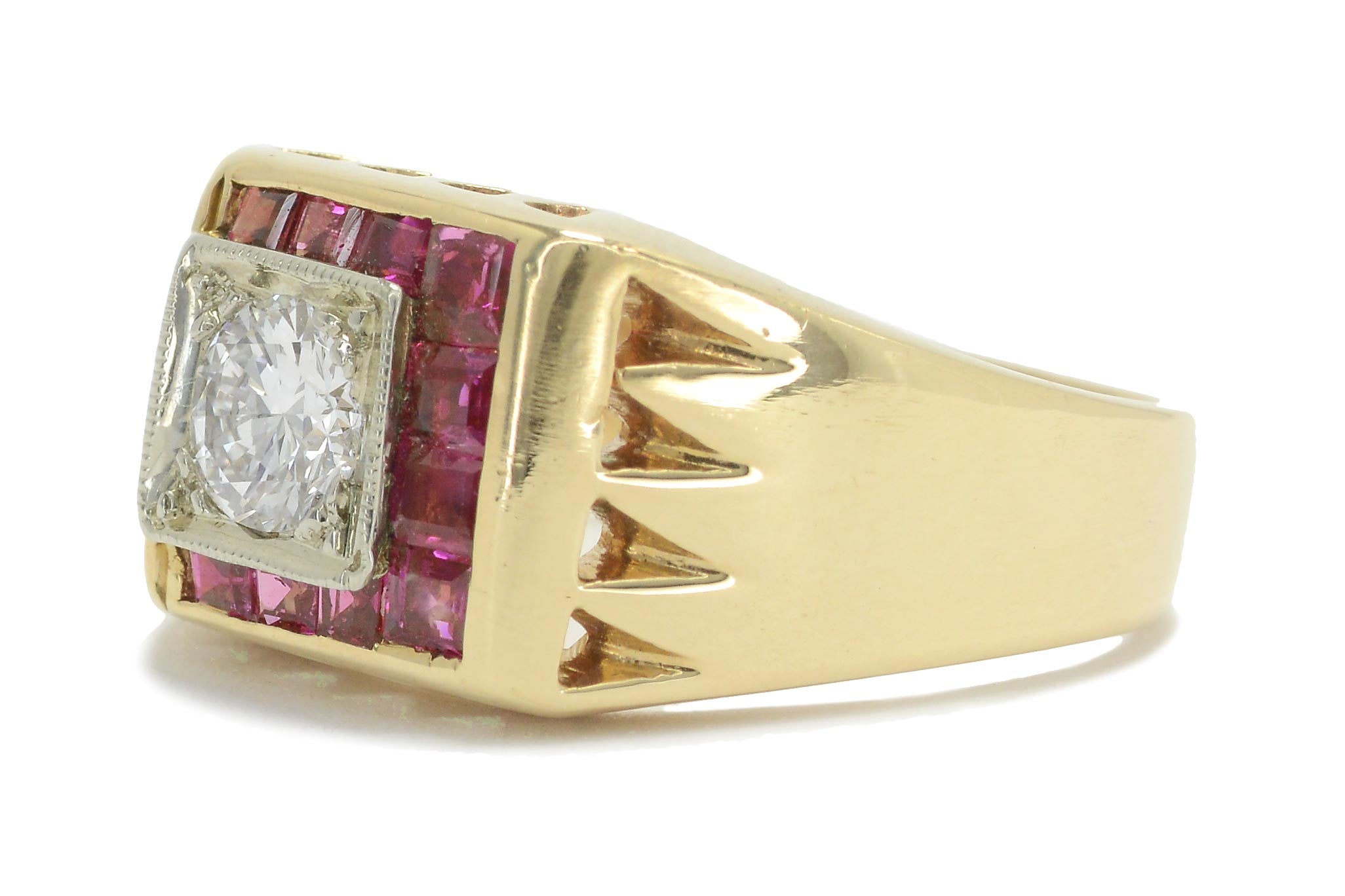 The rich, red rubies are placed in a unique square band setting surrounding the diamond.