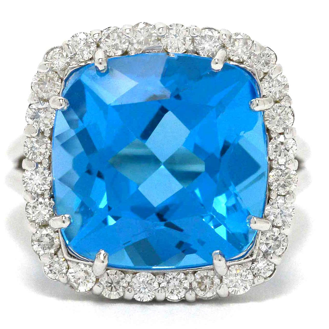 A large, antique square cushion cut blue topaz modern statement ring.