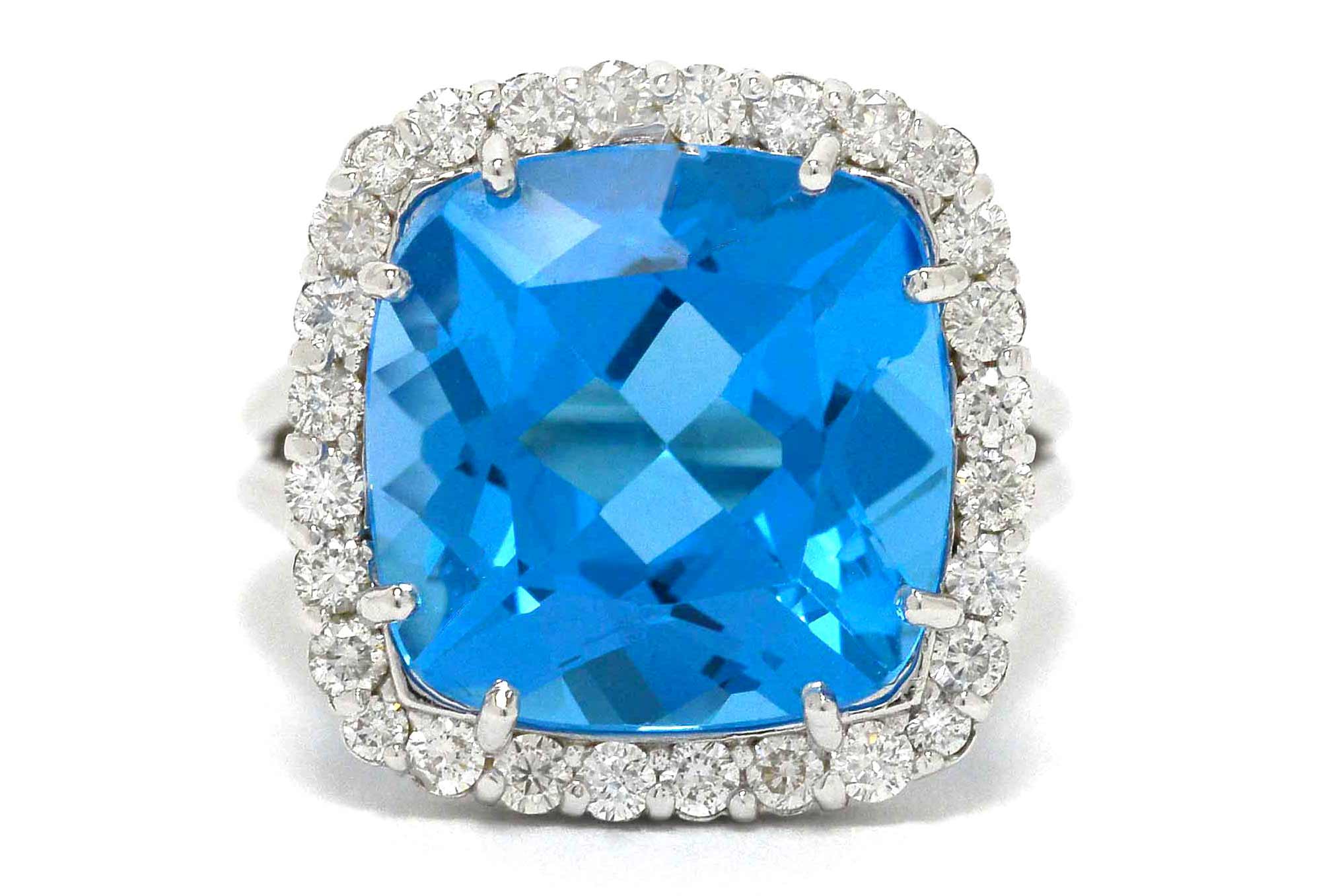A large, antique square cushion cut blue topaz modern statement ring.