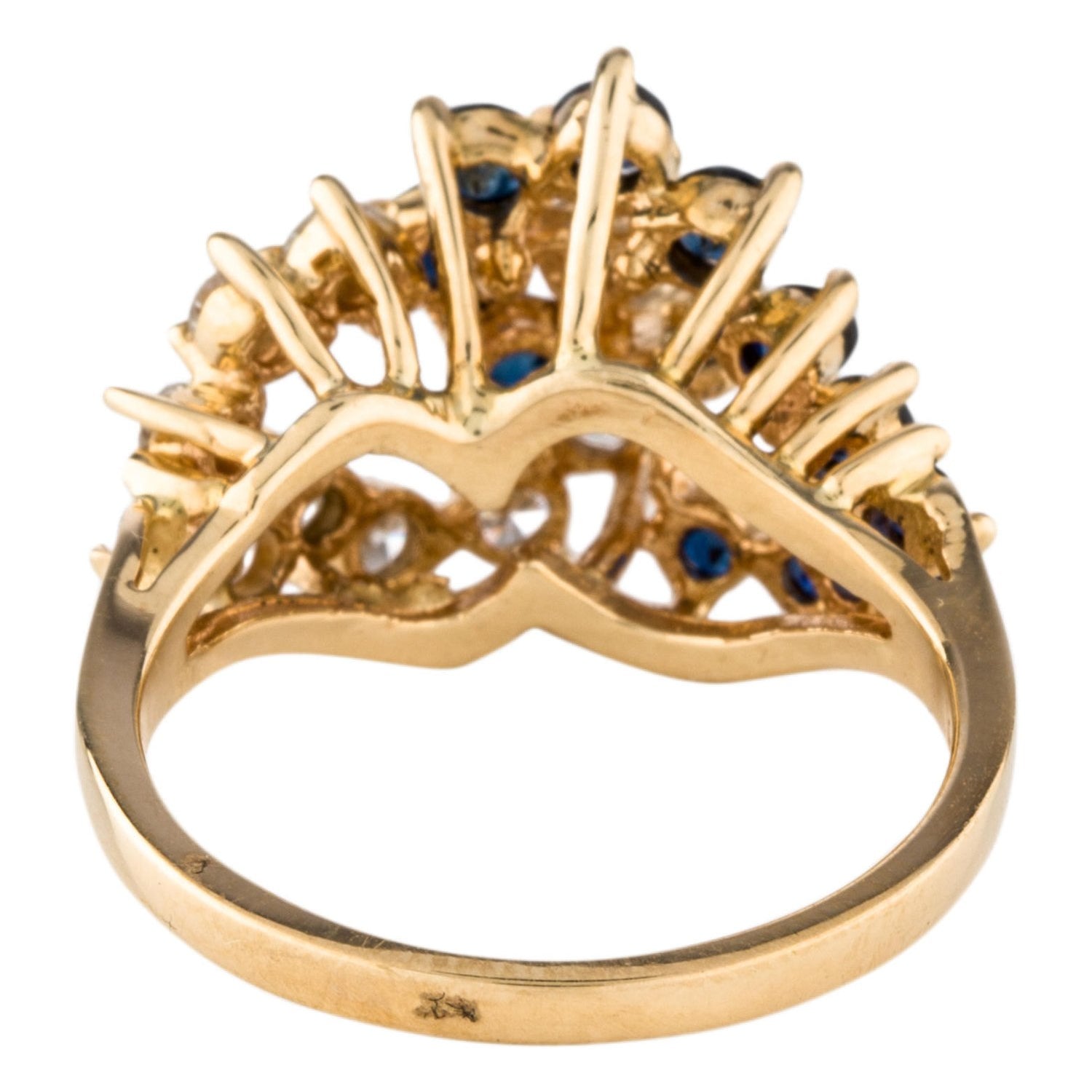 A unique 14k gold cluster ring with diamonds and sapphires.