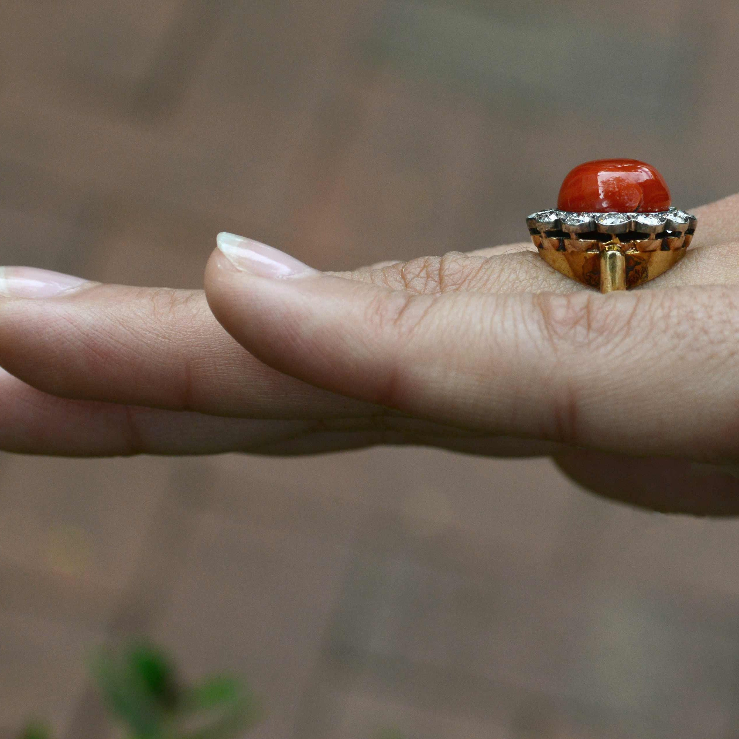 A late 1800's, antique coral dome statement ring.