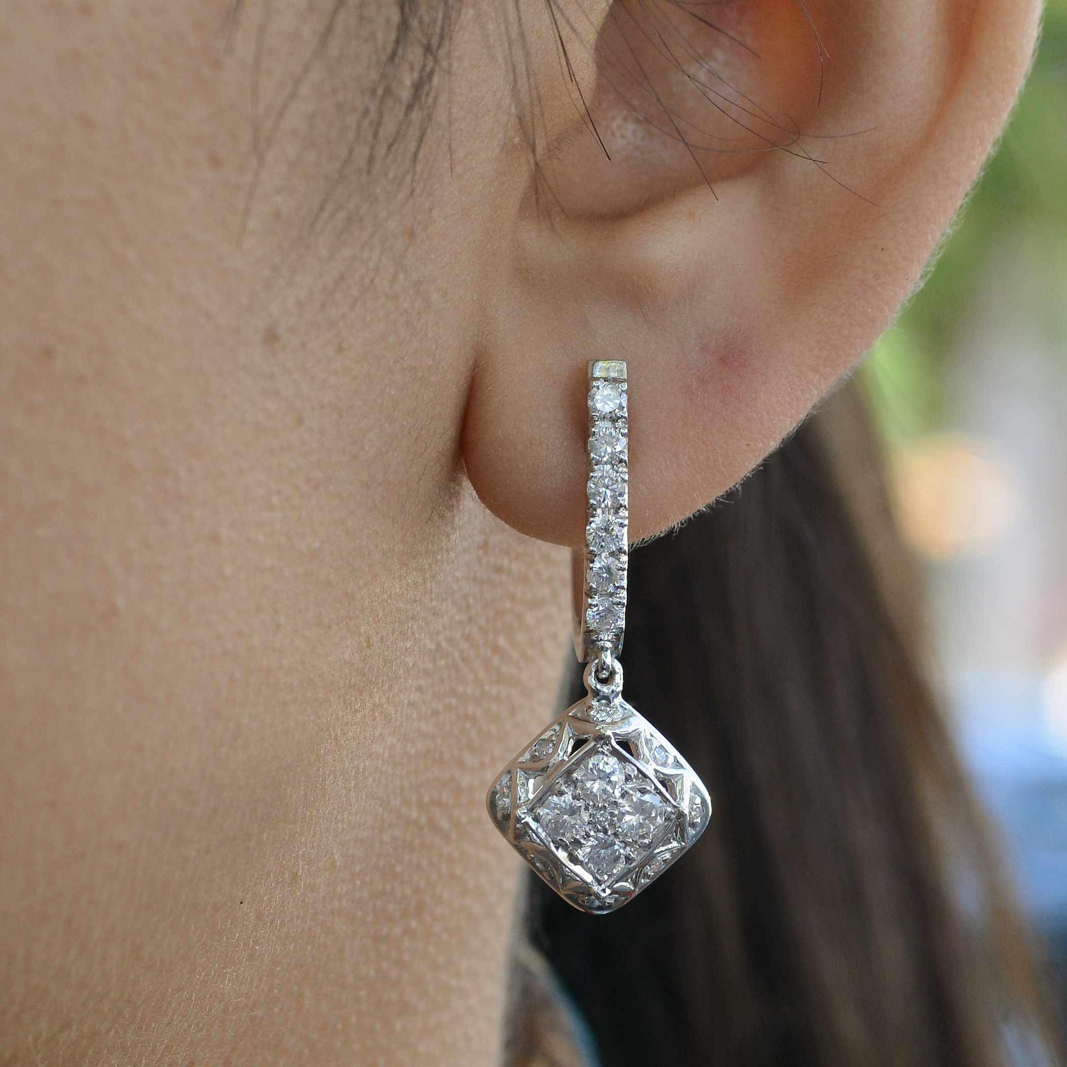 Modern estate diamond dangle earrings from the 2000s.
