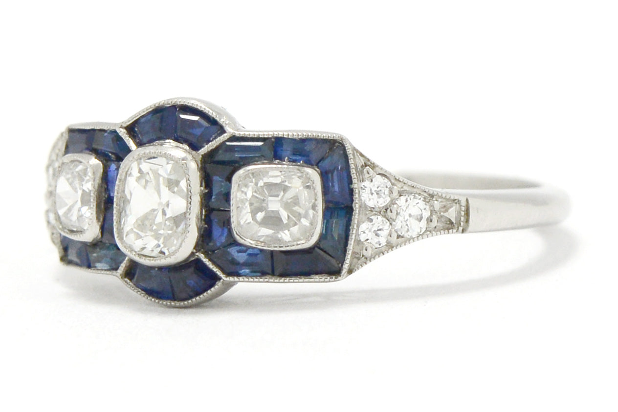 Nearly 2 carats of blue sapphires and diamonds are in this art deco ring.