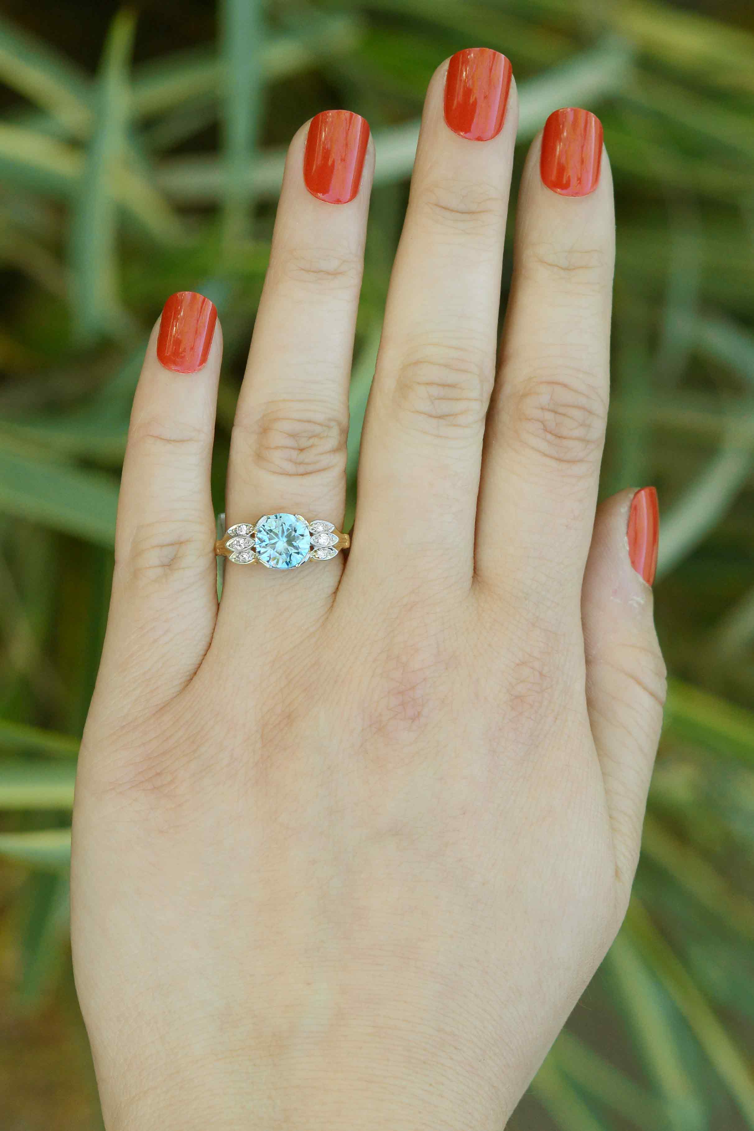 A unique round faceted zircon of almost three carats in a stunning engagement ring.