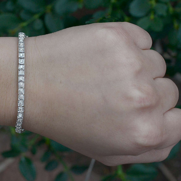 A 1940's Art Deco heirloom bracelet with a single line of diamonds expertly set.