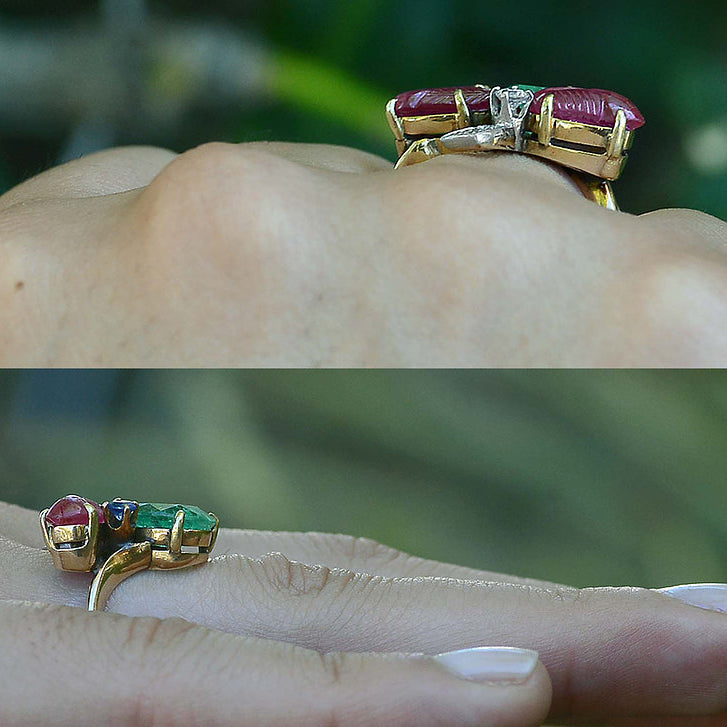 A 3 leaf clover ring with rubies and emeralds.