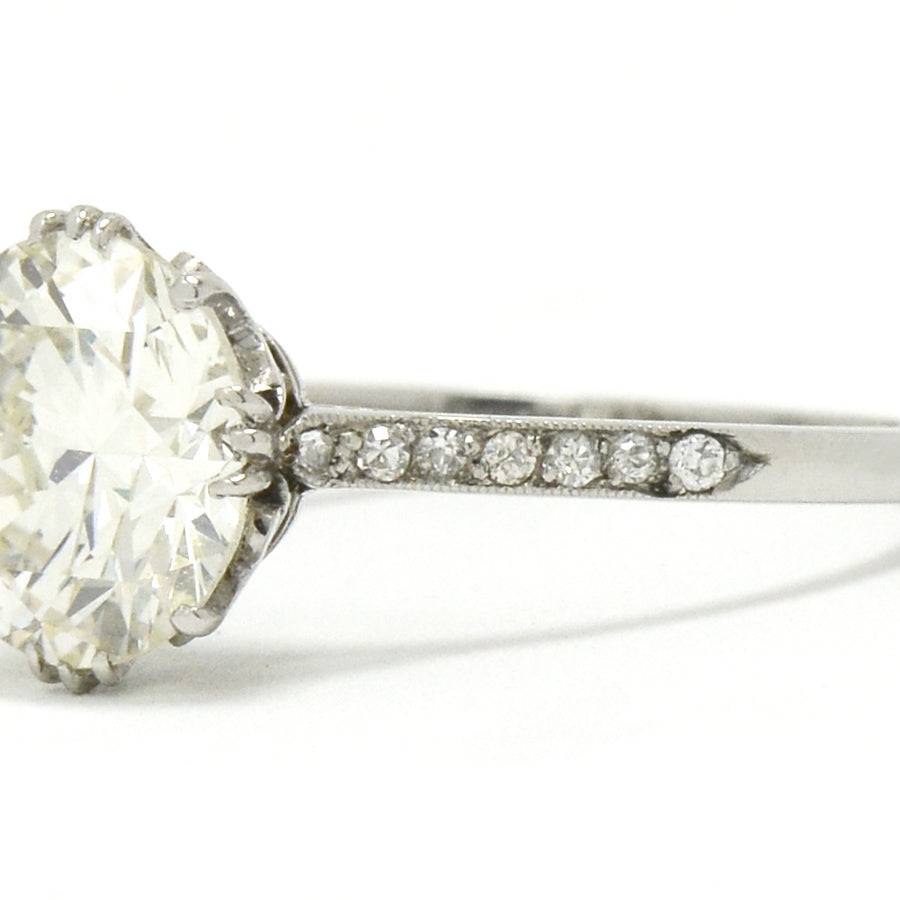 Edwardian style diamond solitaire ring secured by 4 prongs.