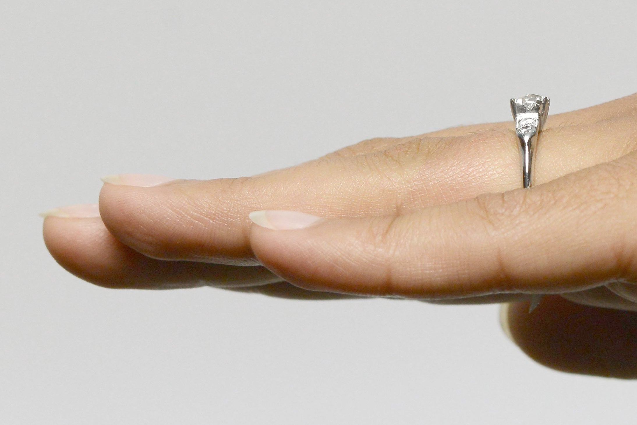 A 5 diamonds solitaire engagement ring.