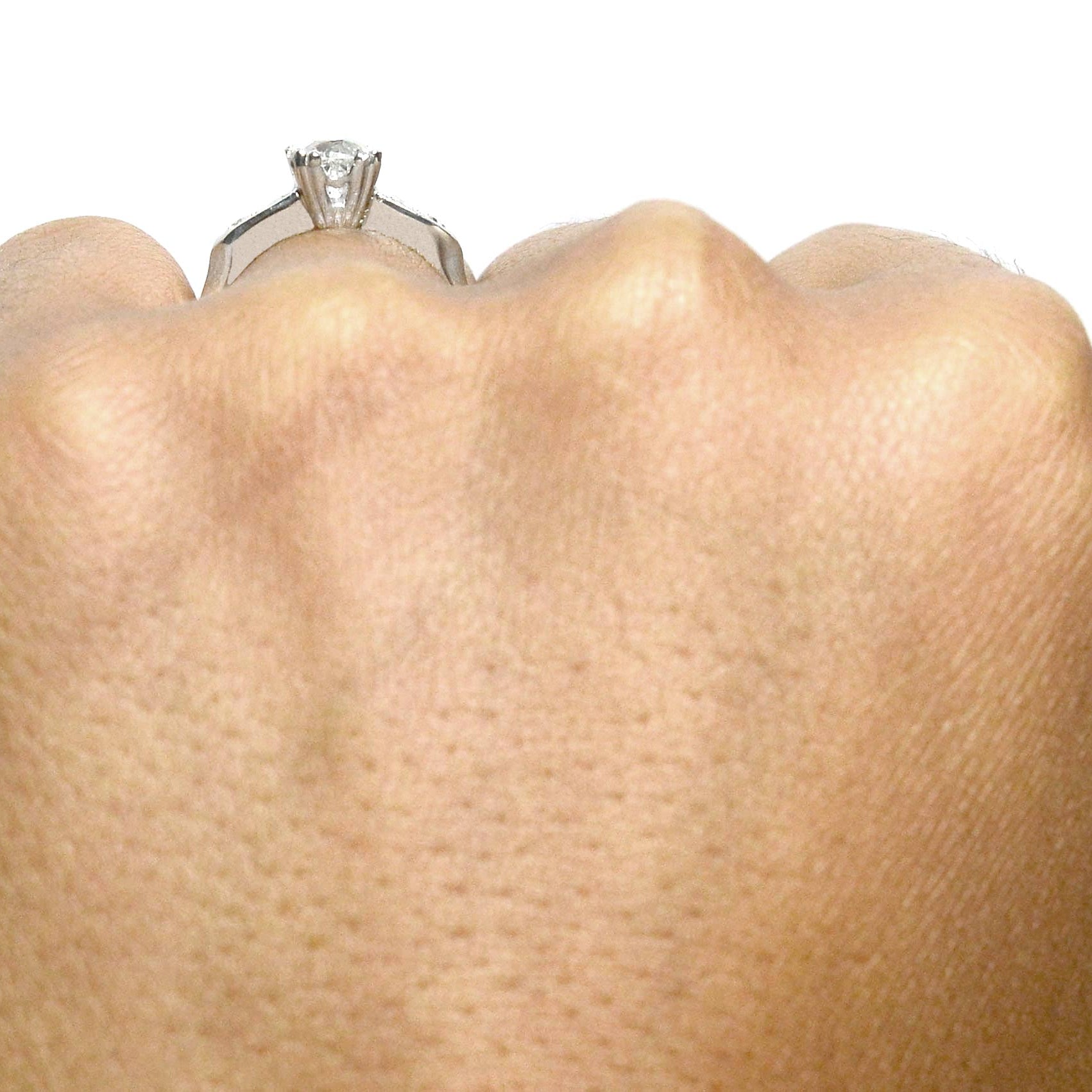 Platinum geometric diamond solitaire.