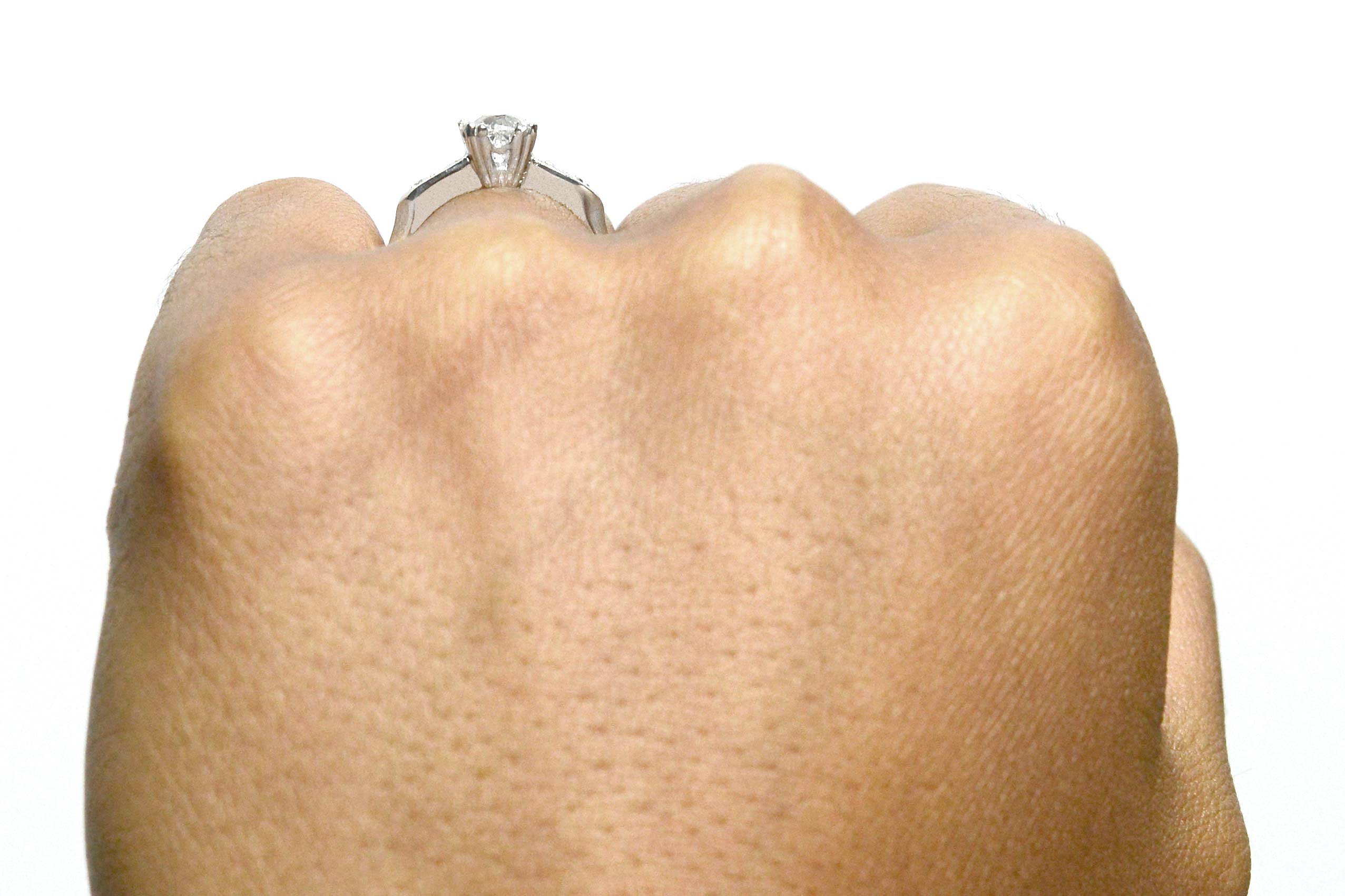 Platinum geometric diamond solitaire.