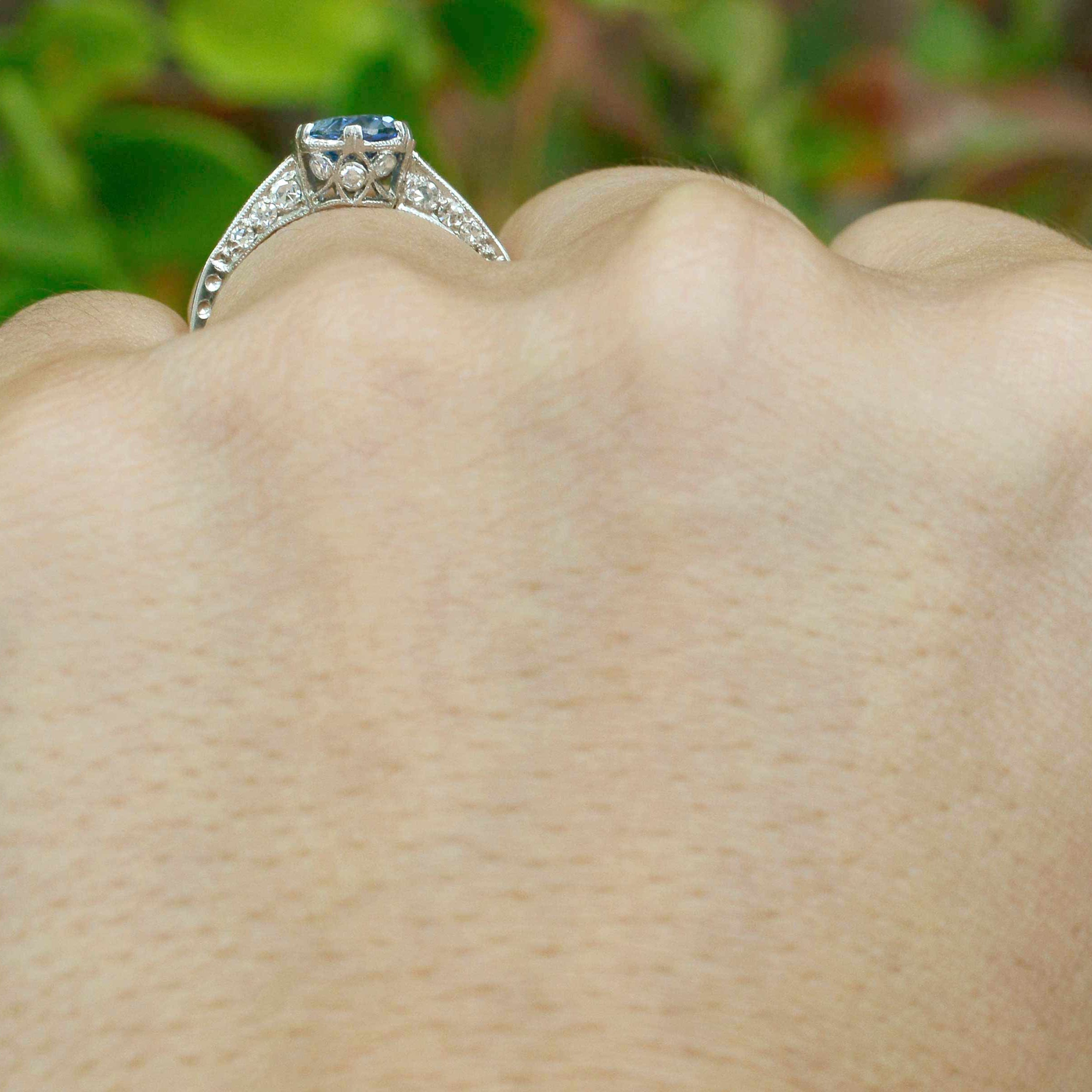 6 prongs support the blue ceylon sapphire platinum Art Deco solitaire engagement ring.