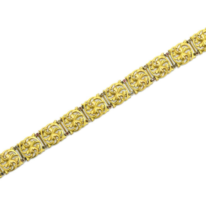 An Art Nouveau / Arts & Crafts 18k filigree link bracelet.