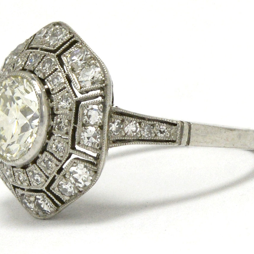 Platinum diamond cluster hexagon wedding ring.