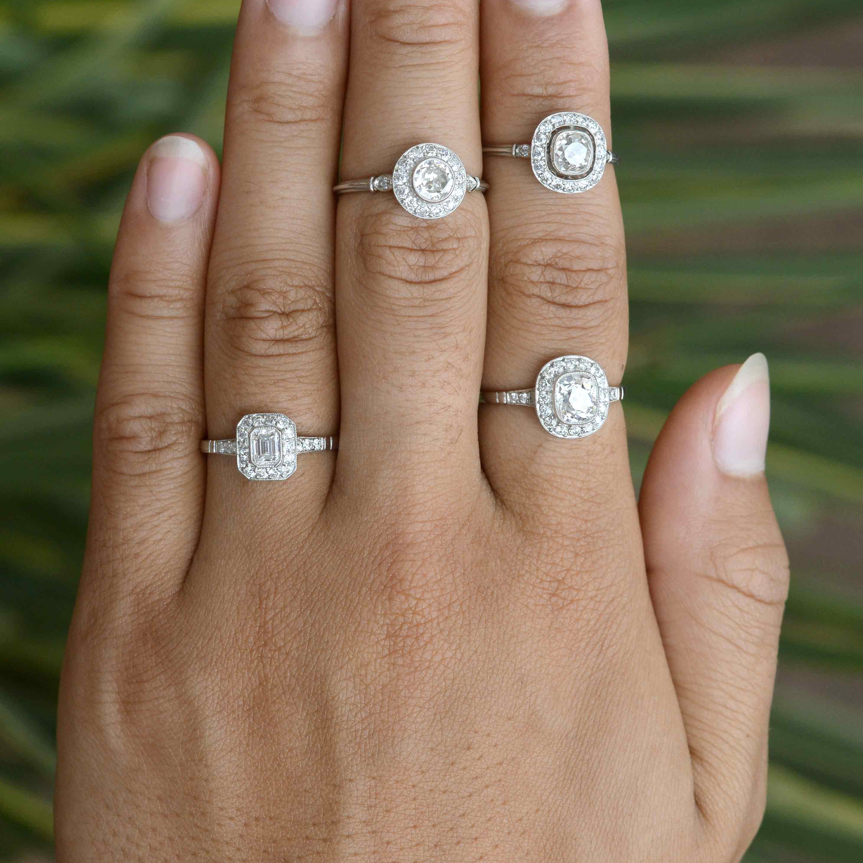 A collection of unique Art Deco style and antique engagement rings.