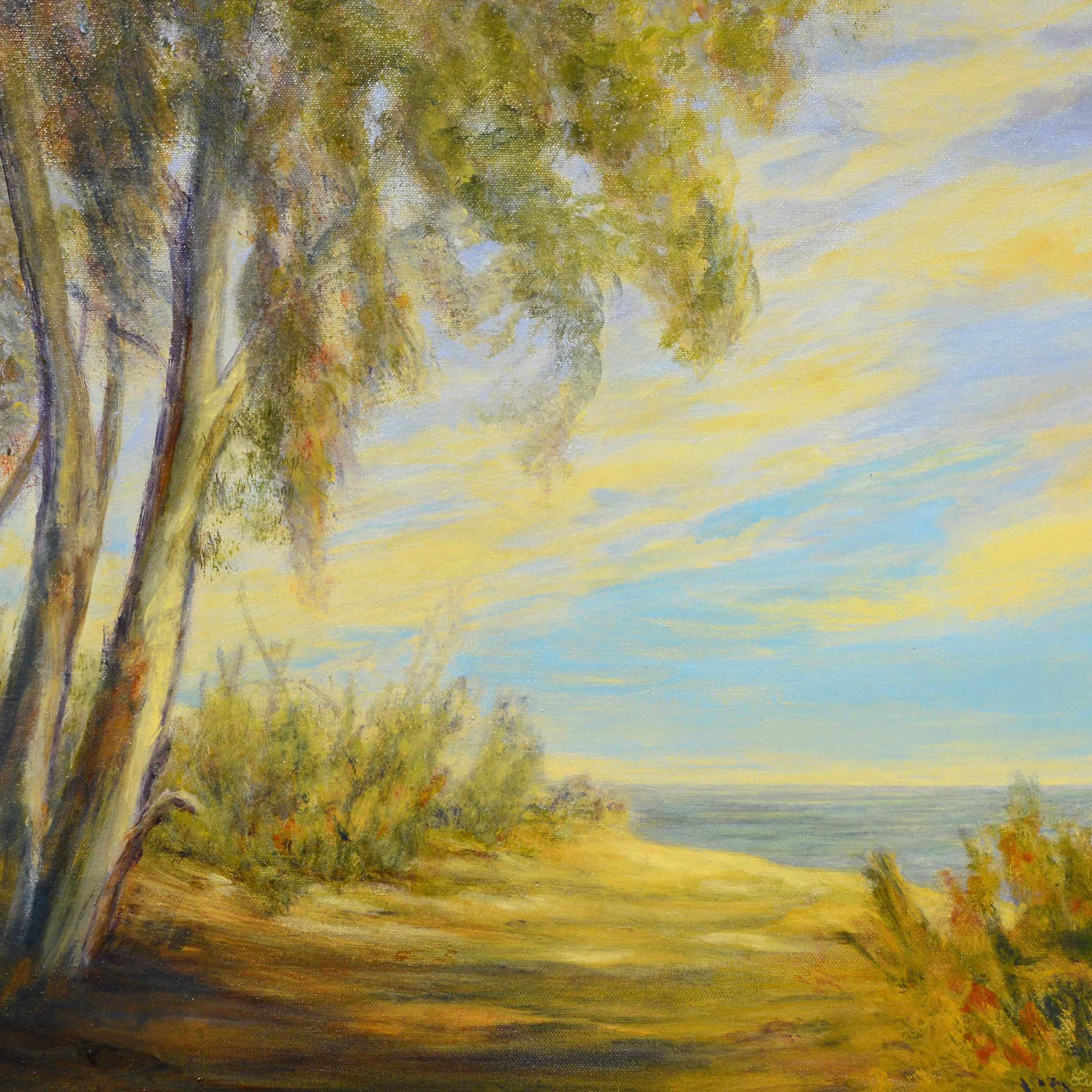 A painting of eucalyptus trees beside the ocean.