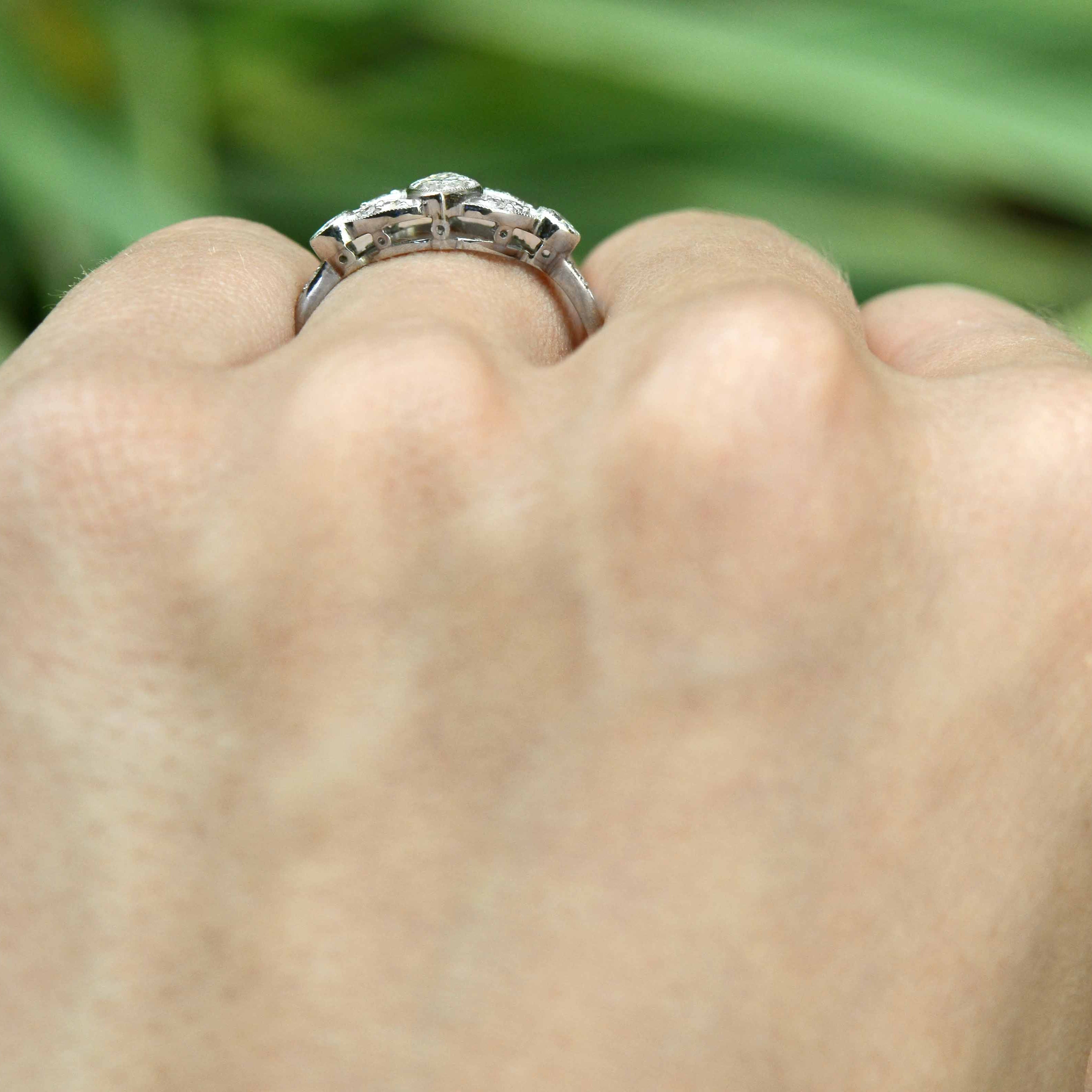 A filigree setting platinum diamond ring.