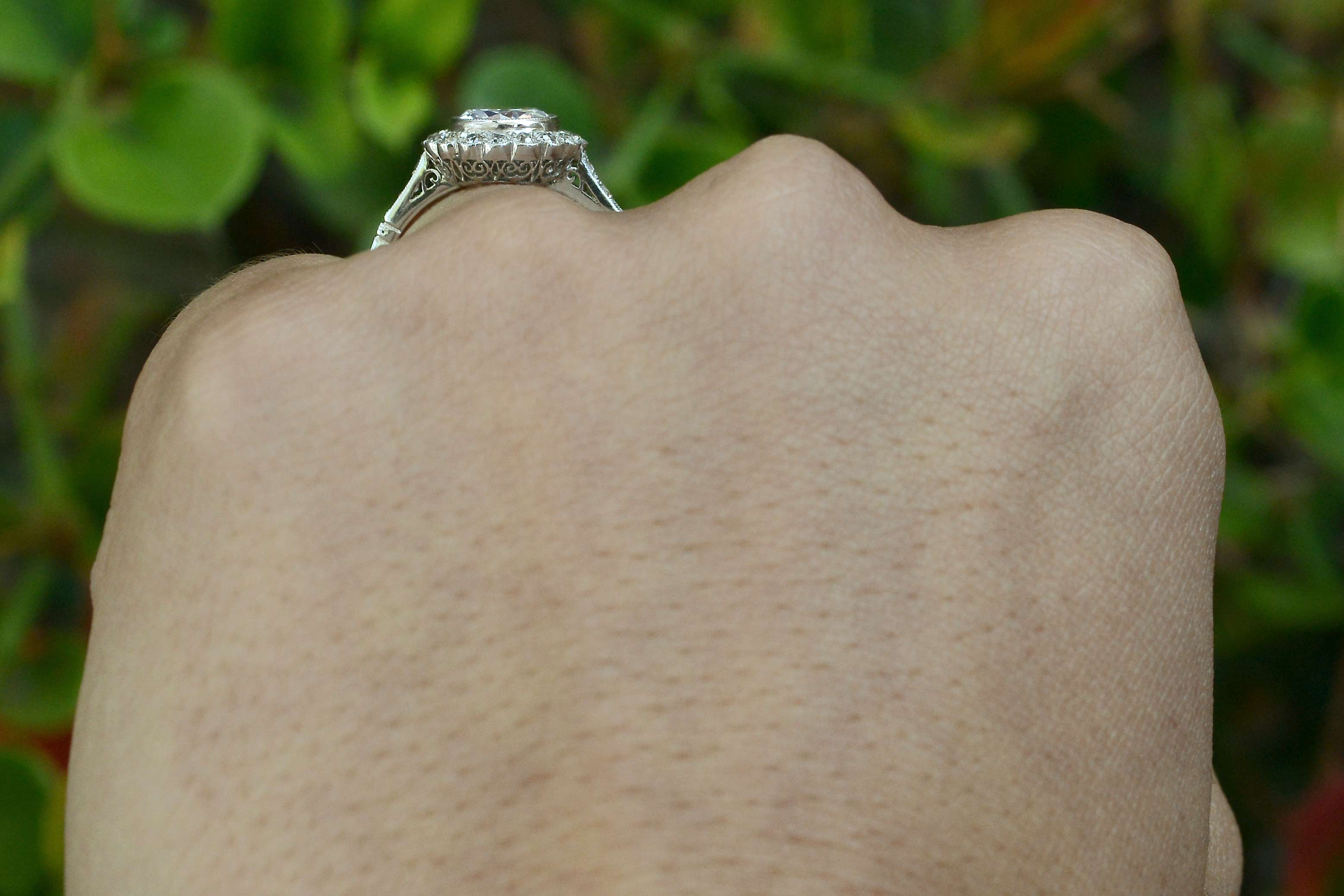A diamond bezel set Edwardian wedding ring.