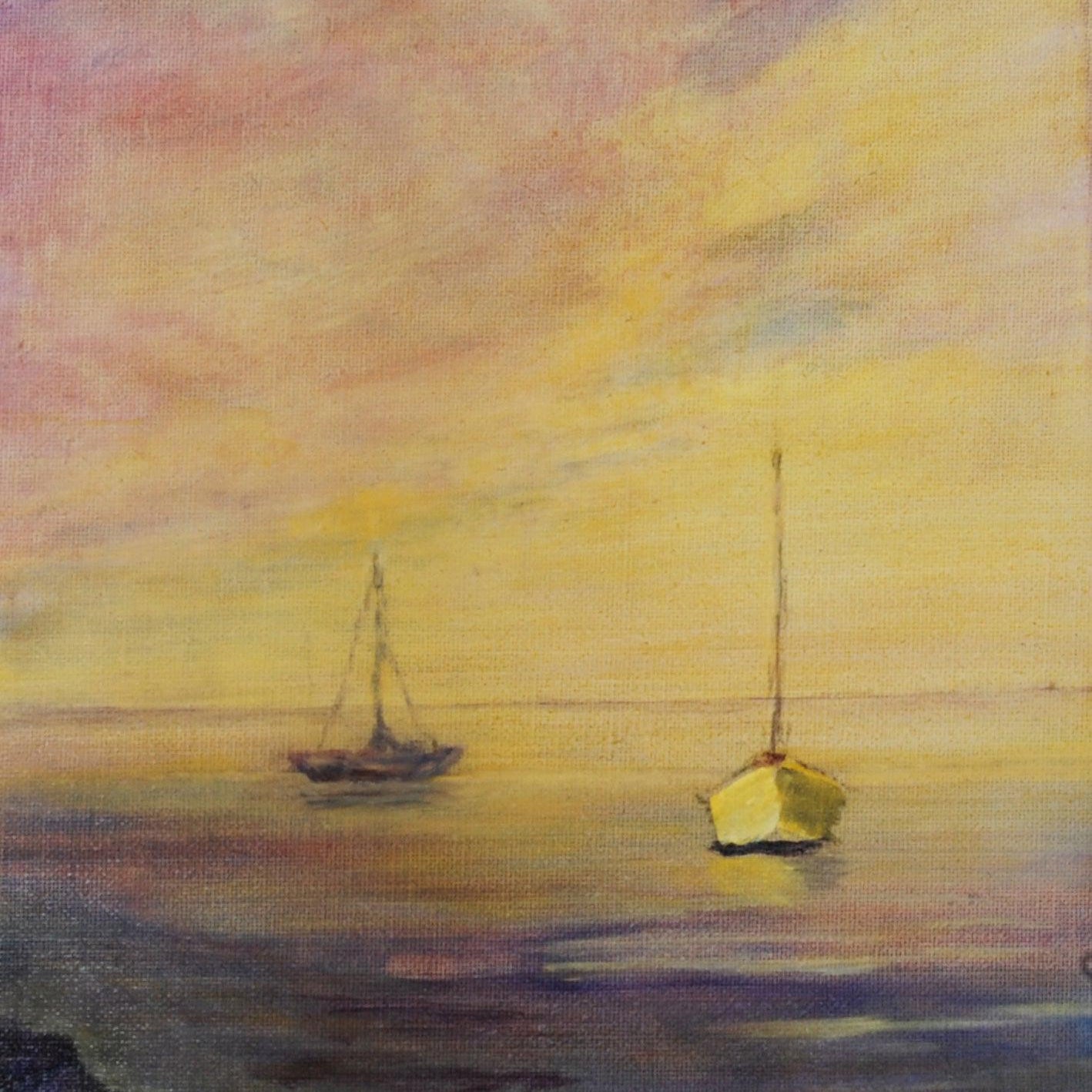 2 boats off the shoreline in Santa Barbara.