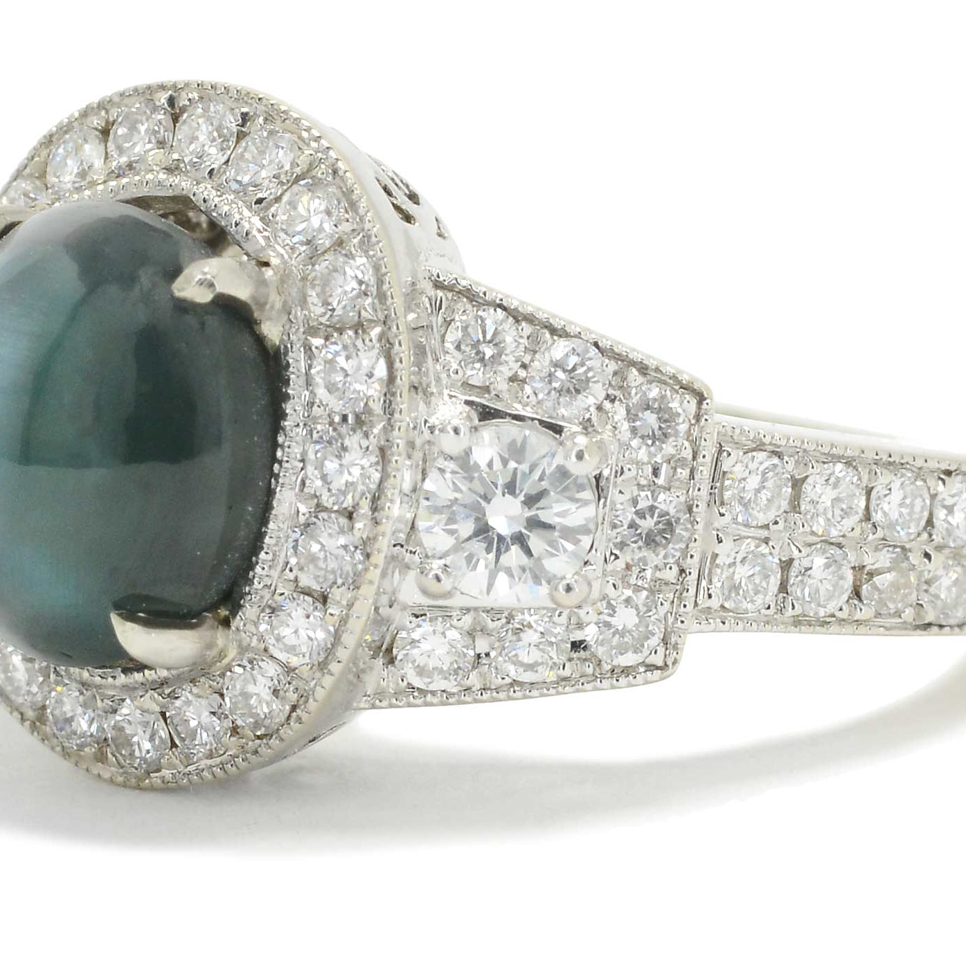 An excellent example of alexandrite, this oval cabochon cut specimen has bluish green color.