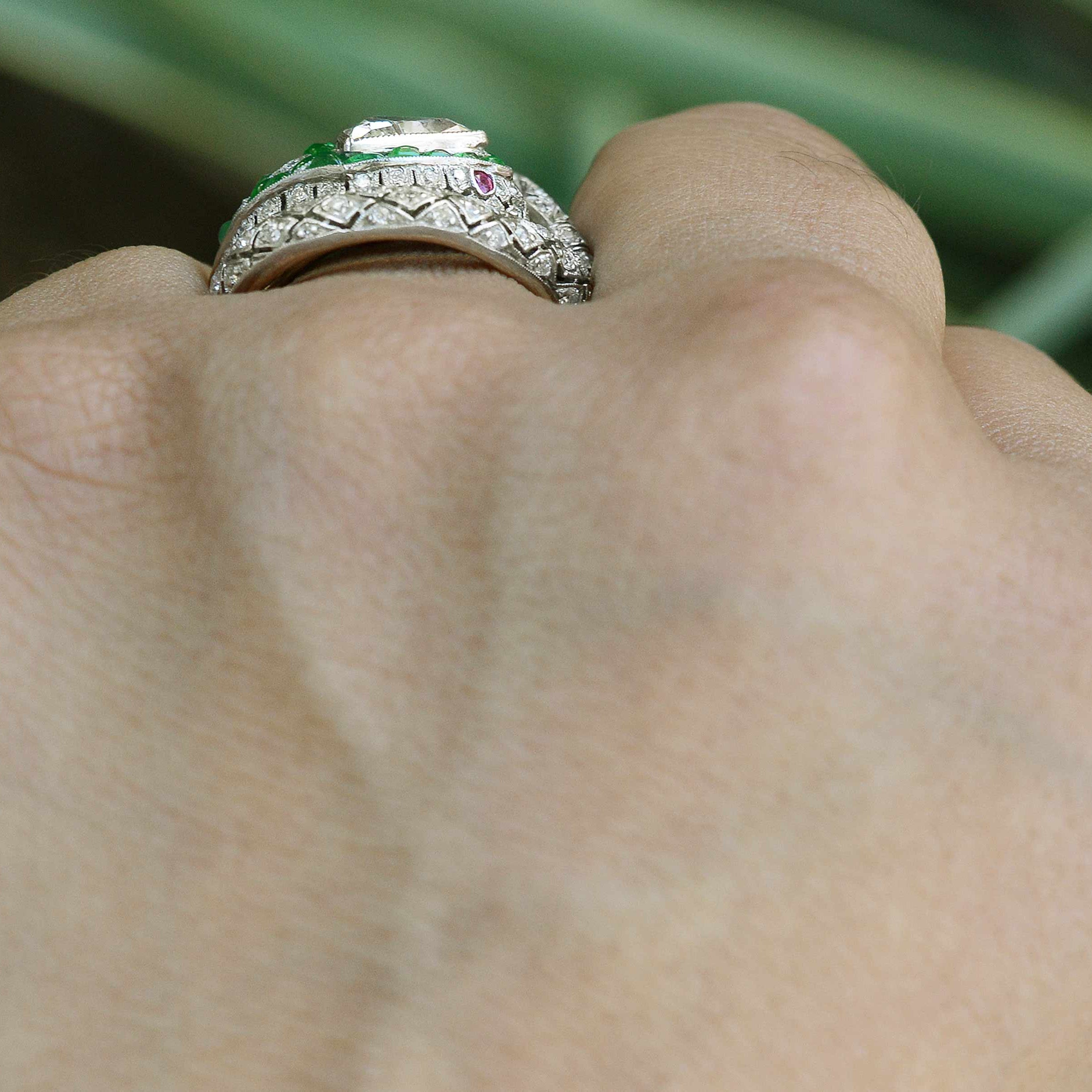 An Egyptian inspired diamond and emerald ring.