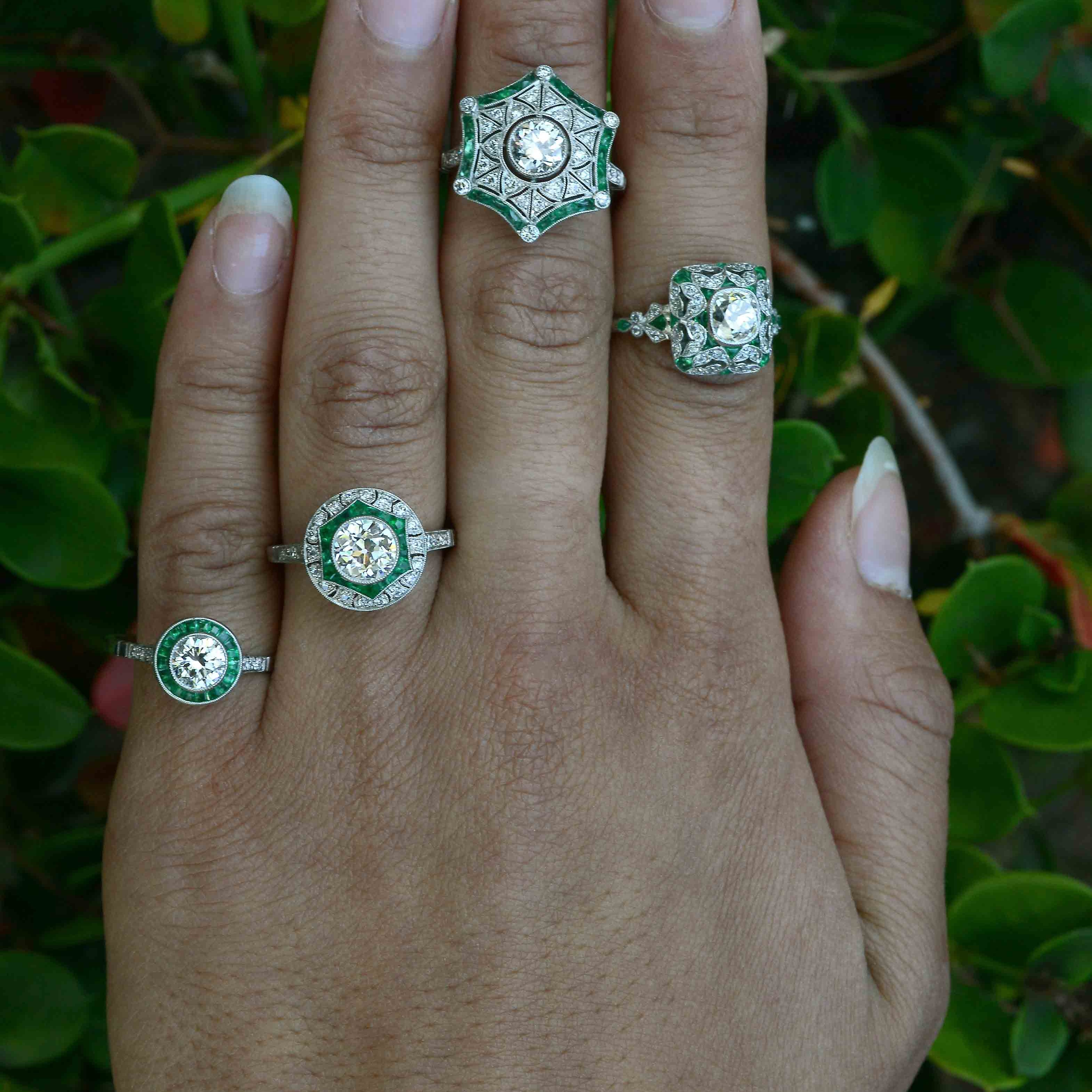 Diamond and emerald Art Deco wedding rings.