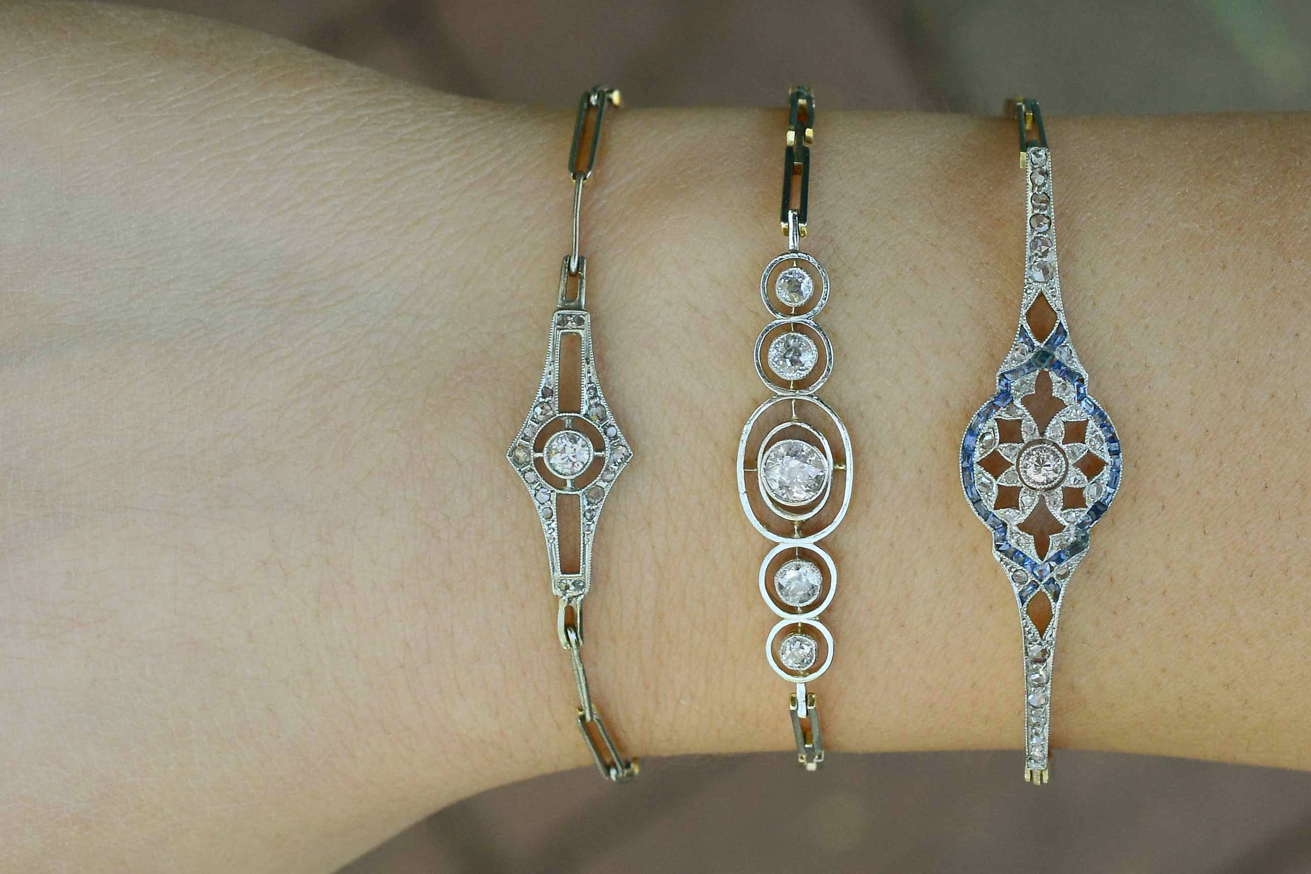 Here are some other antique diamond cluster tennis bracelets in stock.