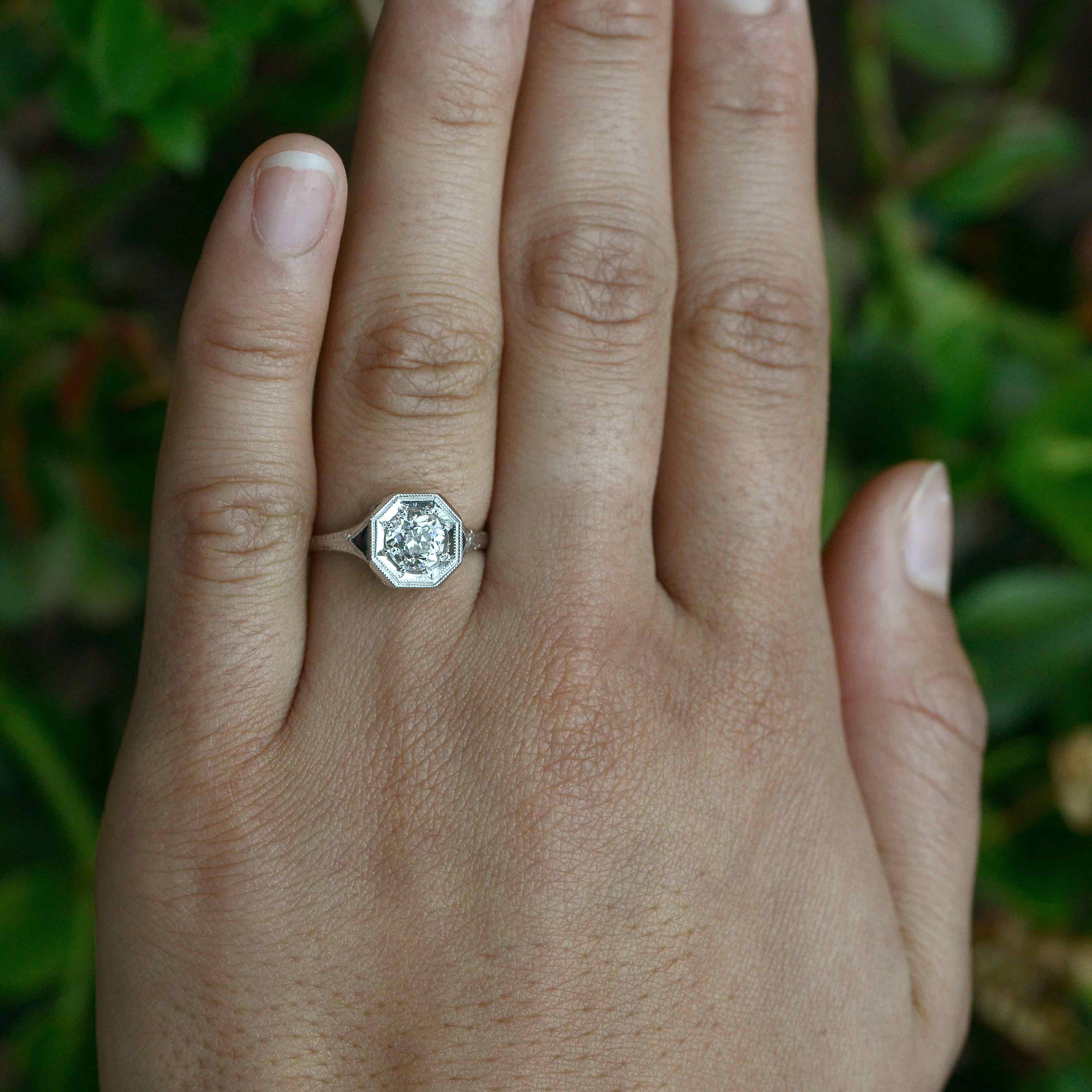 An old European diamond wedding ring with 2 blue sapphires.