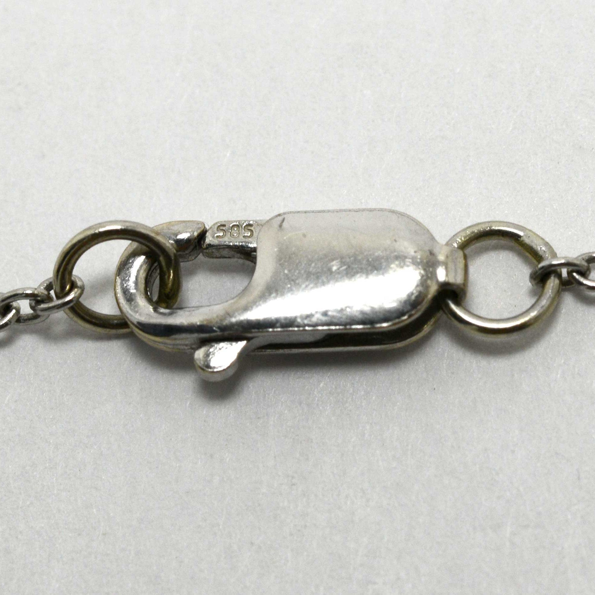 An antique platinum necklace with a spring clasp fastening.
