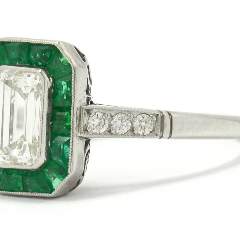 Old cut diamonds and a 1 carat emerald target engagement ring.