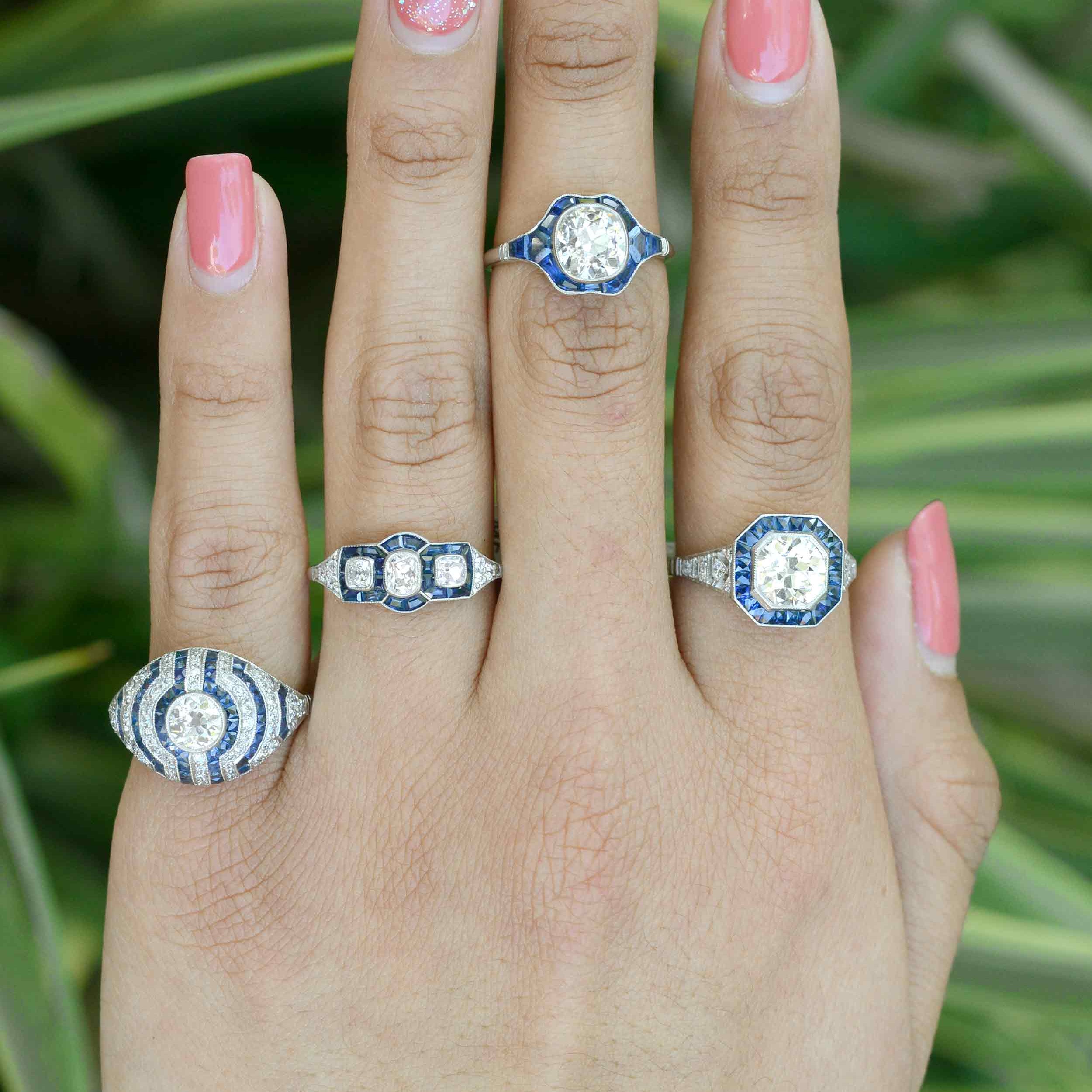 Art Deco diamond and blue sapphire, platinum engagement rings.