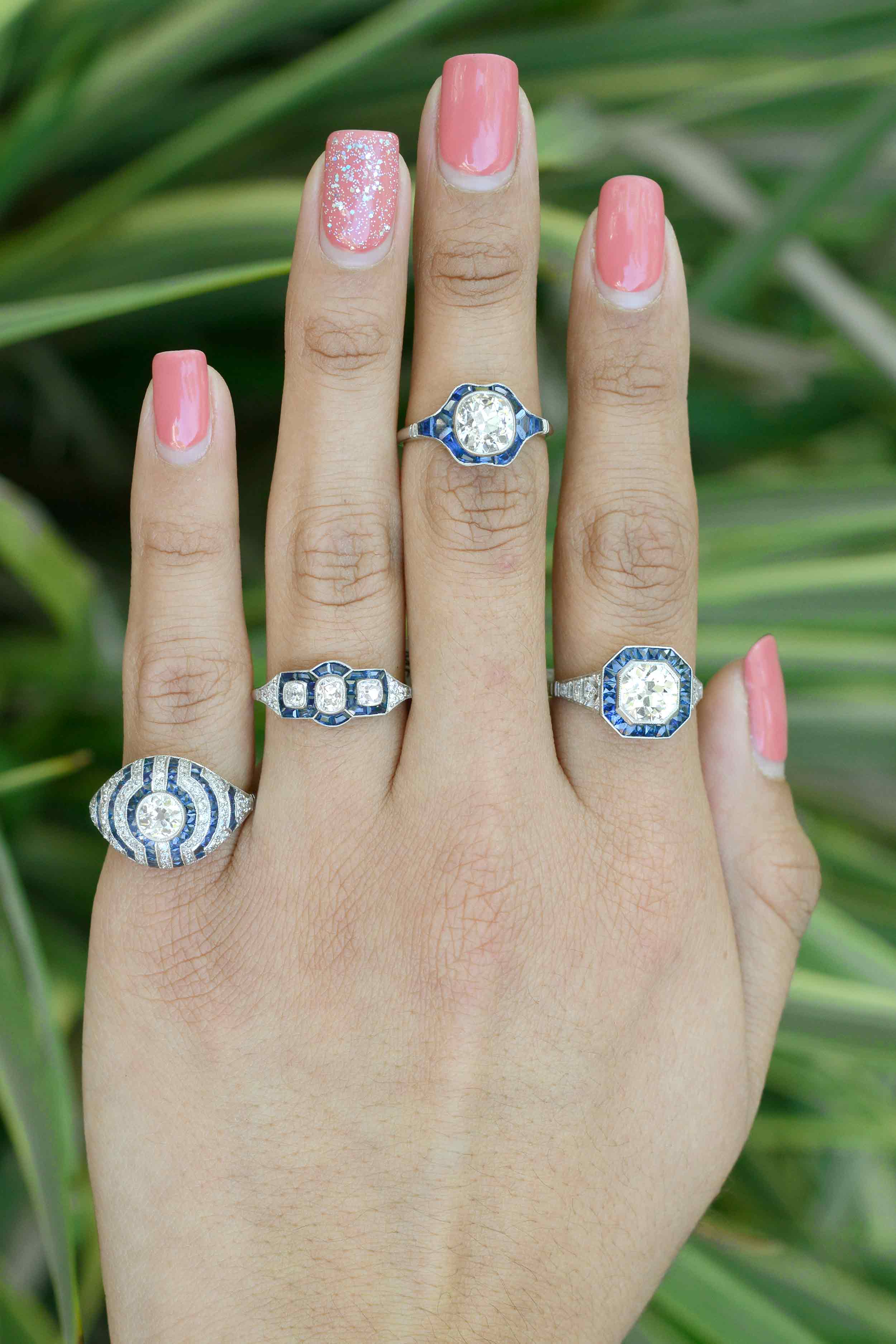 Art Deco diamond and blue sapphire, platinum engagement rings.