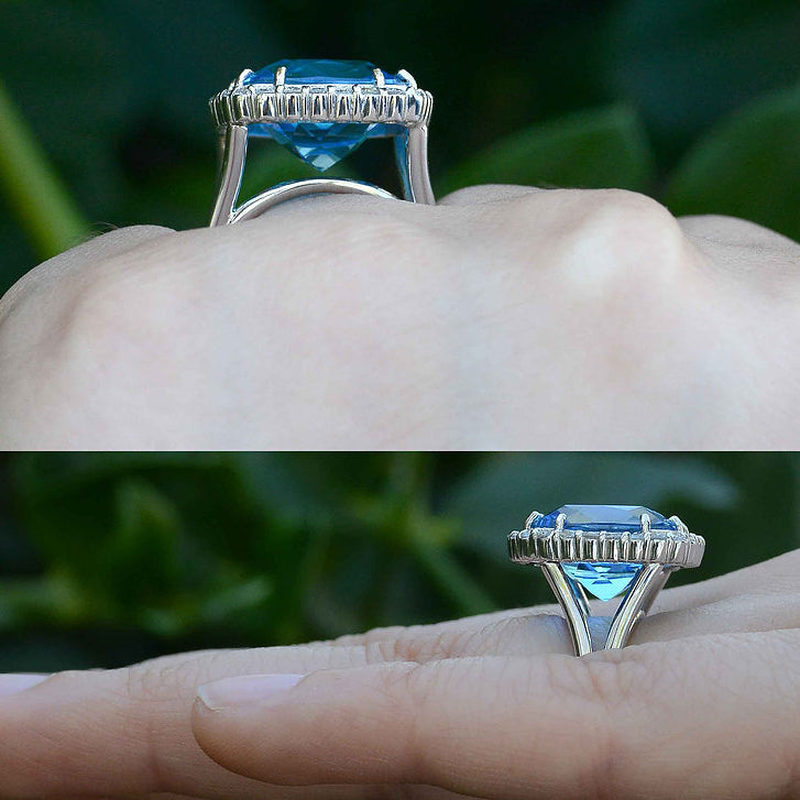 A new, tall antique square cushion blue topaz modern ring design.