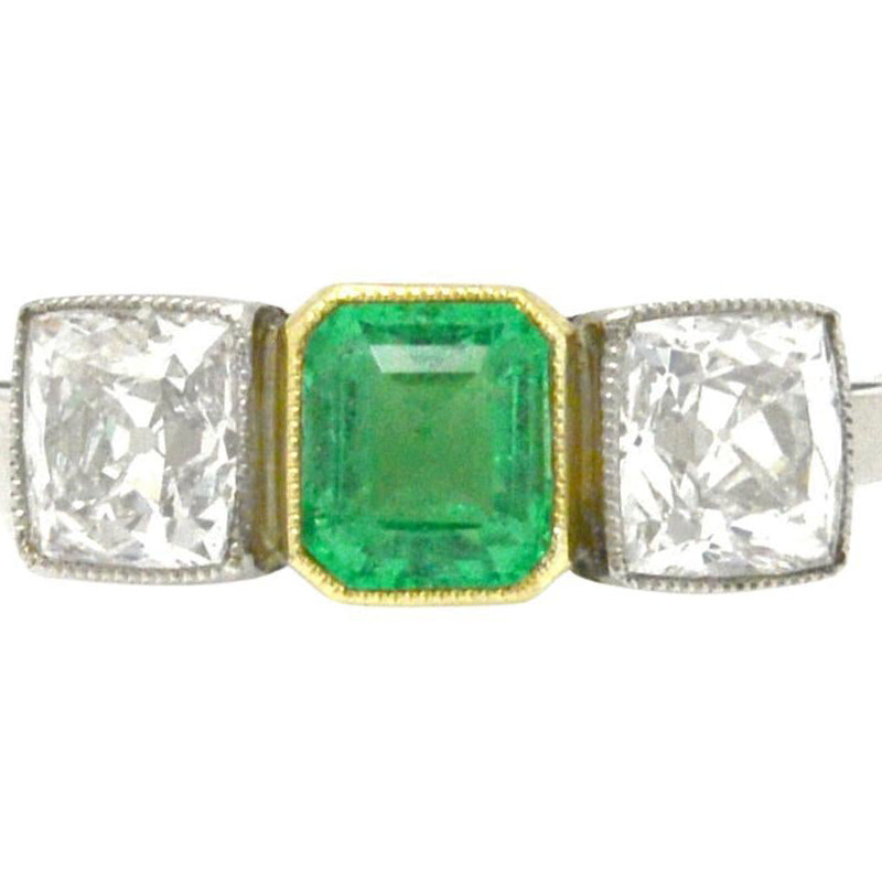 2 carat emerald cut and diamond Art Deco engagement ring.
