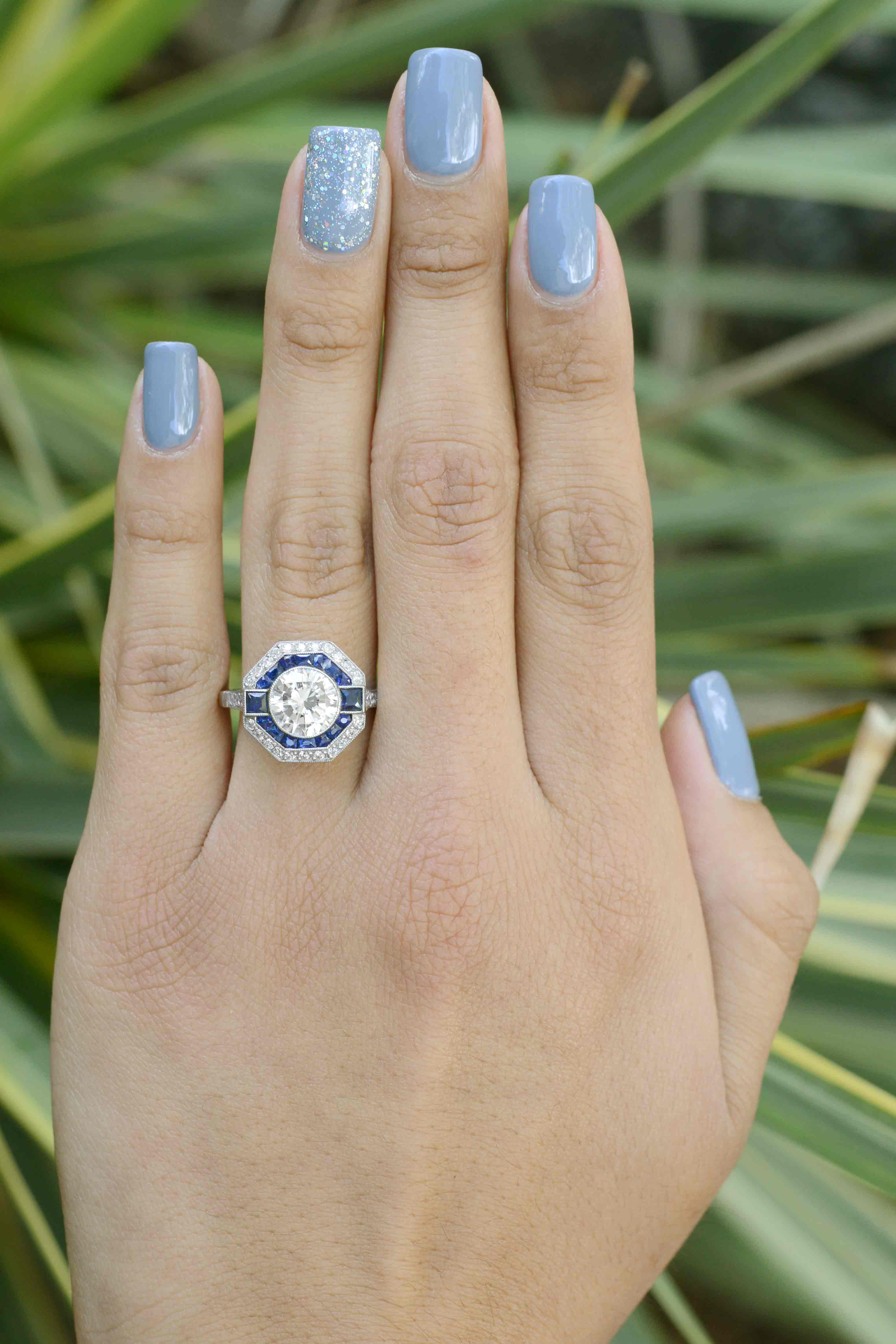 A platinum sapphire and diamond octagon, Art Deco style wedding ring.