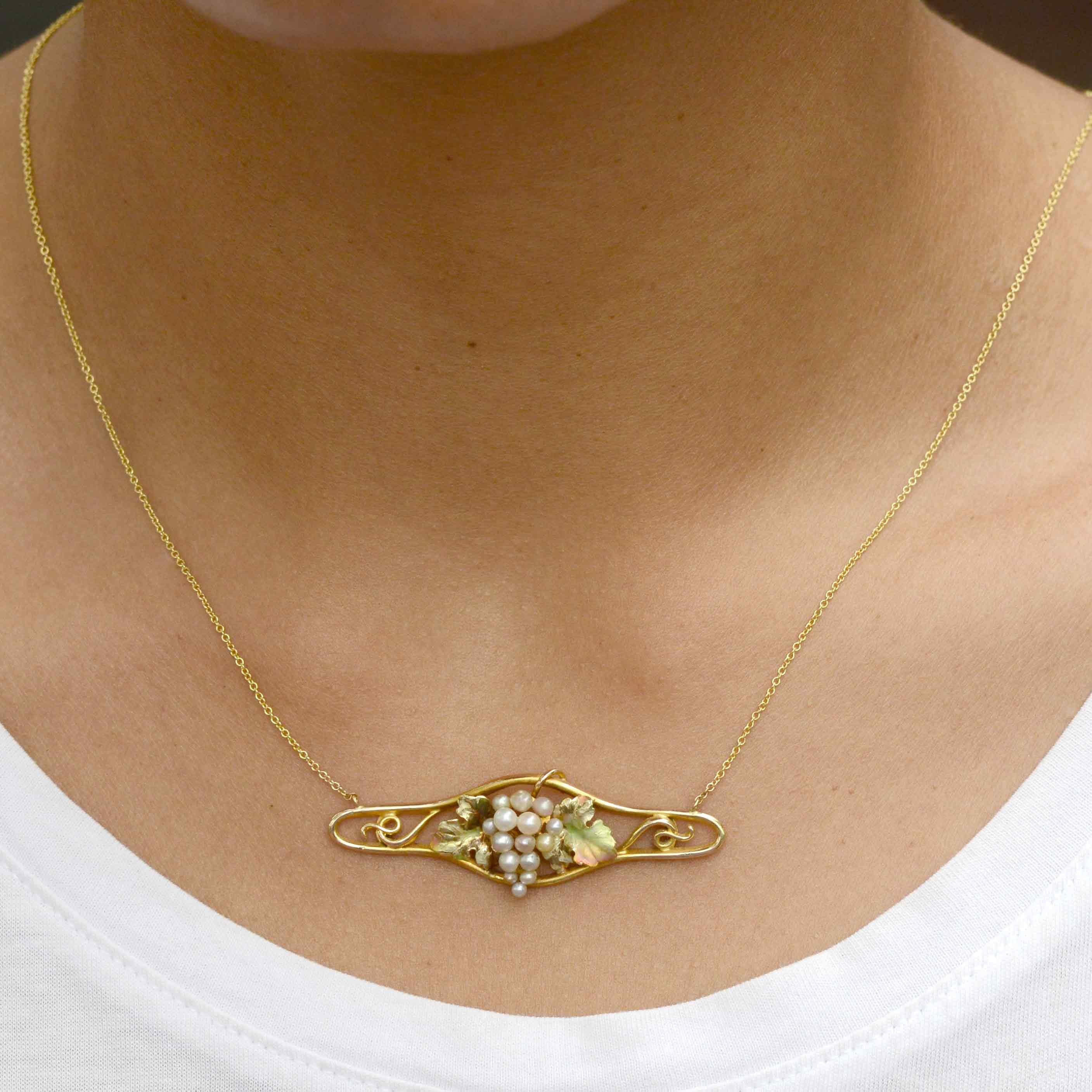 A 1910 Art Nouveau necklace with pearls set in the shape of grapes.