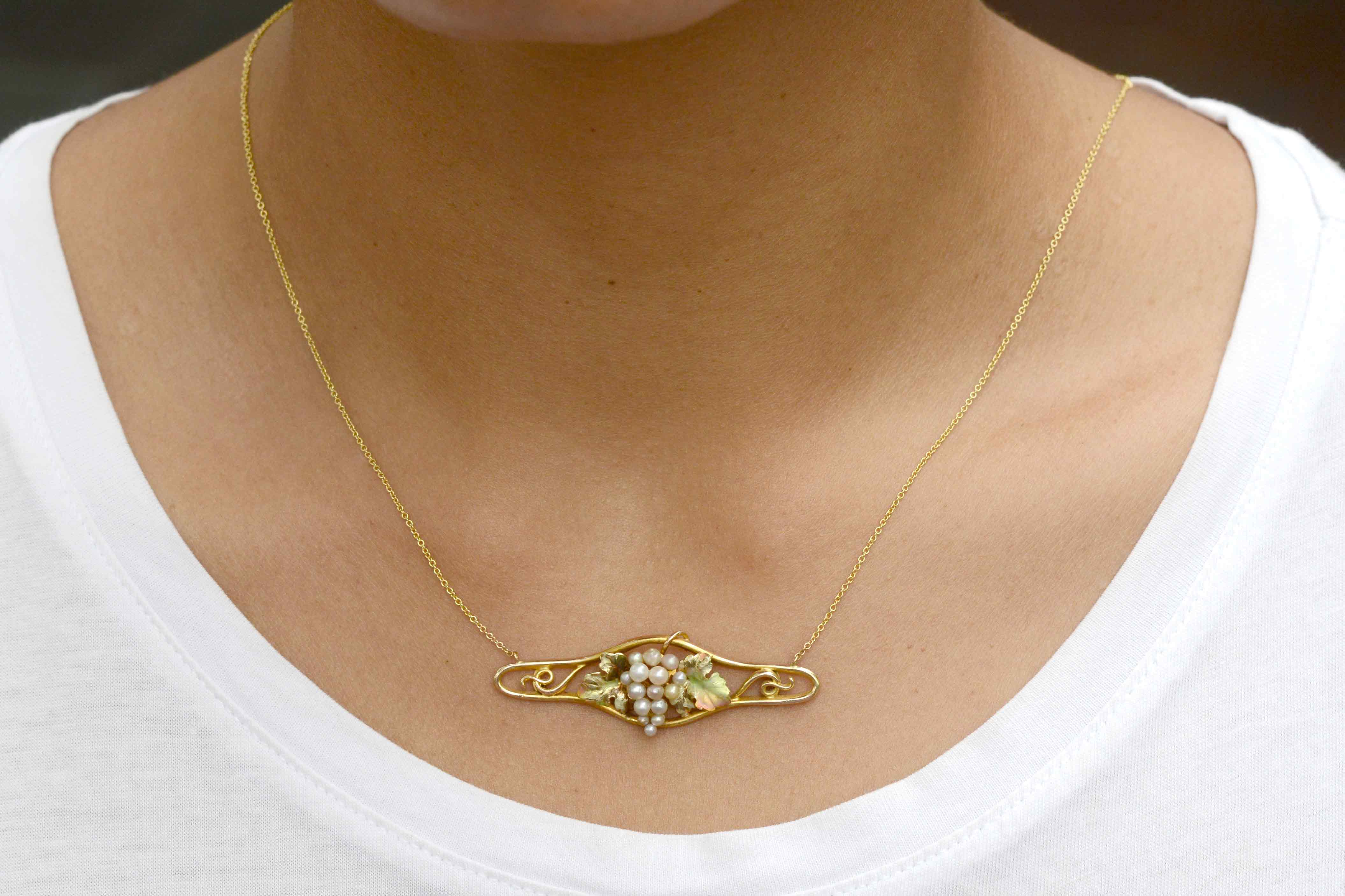 A 1910 Art Nouveau necklace with pearls set in the shape of grapes.