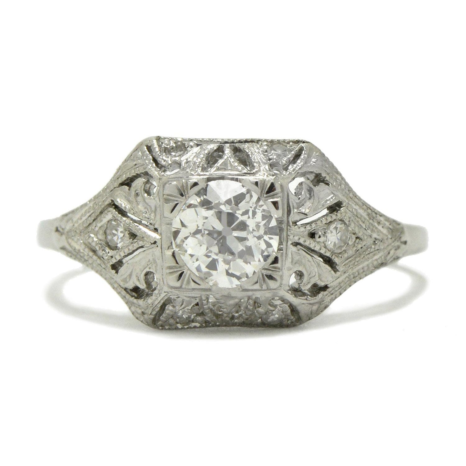 Half carat diamond heirloom platinum engagement ring.