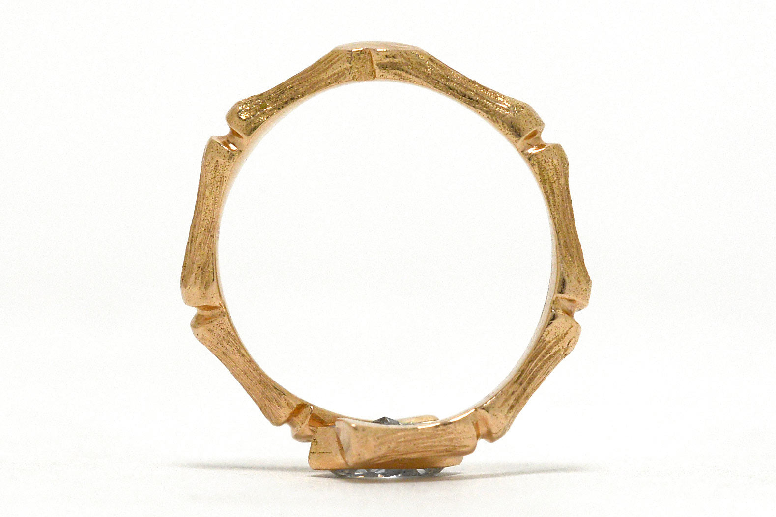 A rose gold bamboo wrapped pattern.