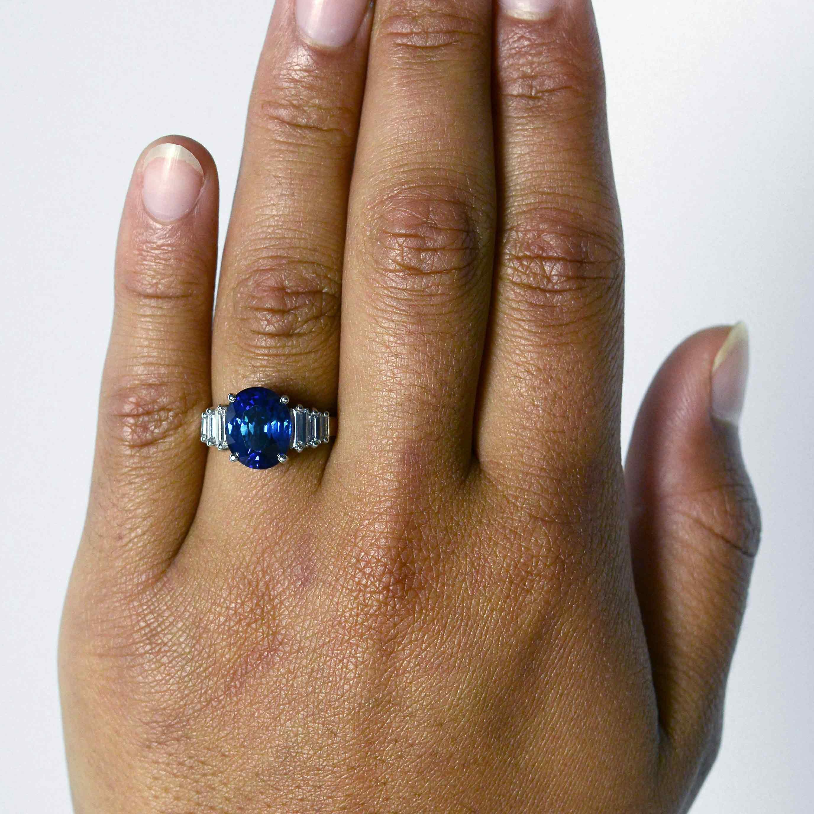 This size 7 Art Deco revival wedding ring has a 4 carat blue sapphire.