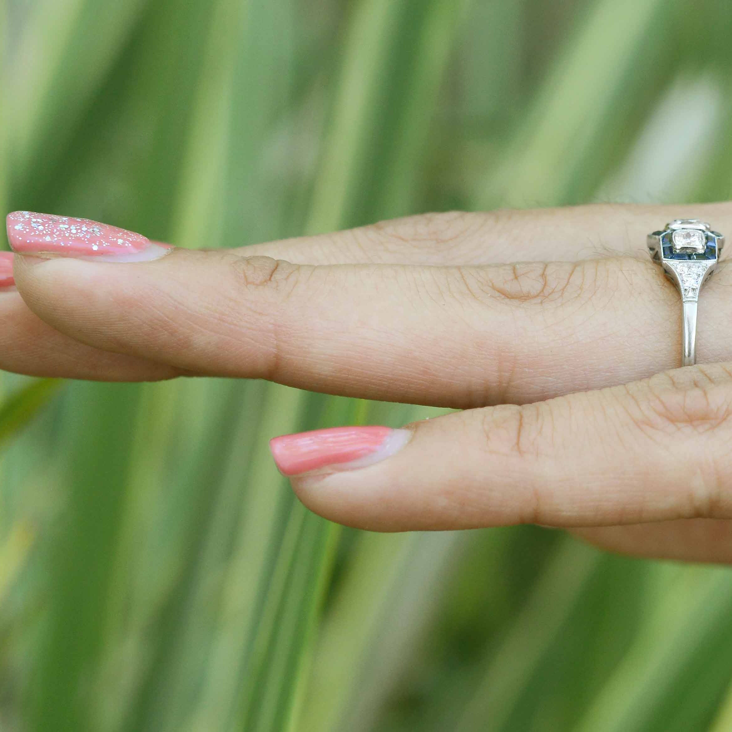 Art Deco trilogy sapphires and diamonds engagement ring.
