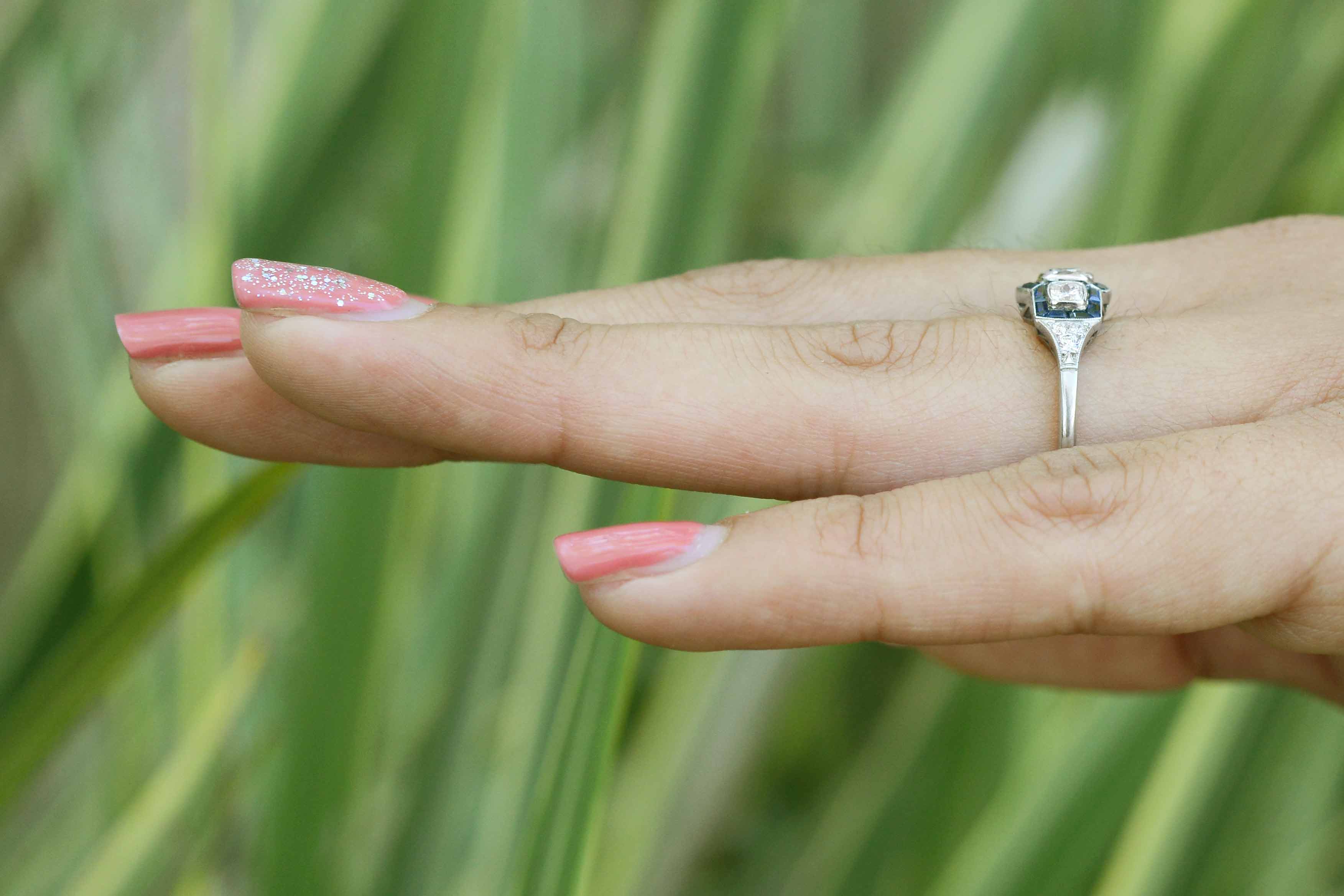 Art Deco trilogy sapphires and diamonds engagement ring.