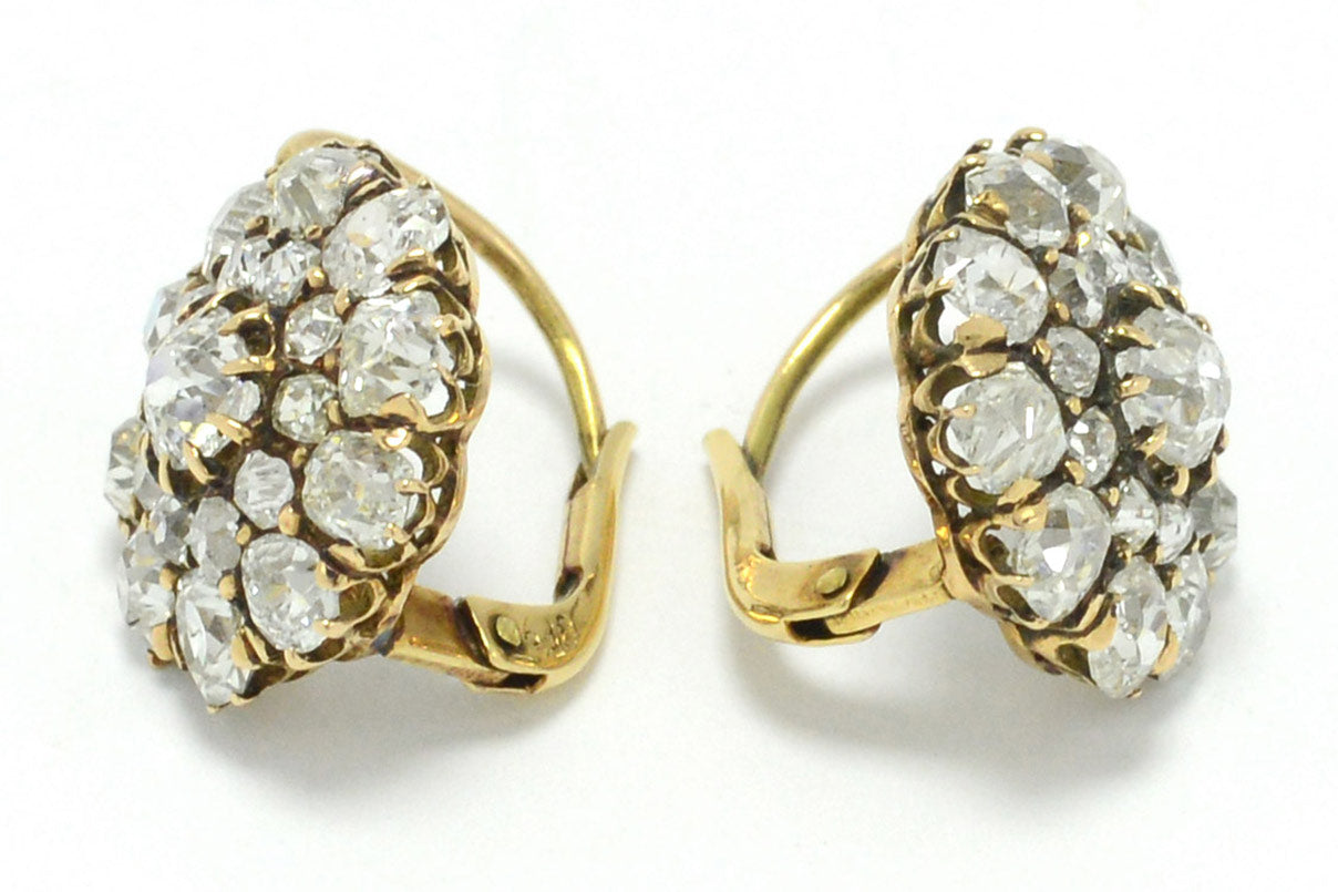 A flower cluster earring design with over over six carats of diamonds.