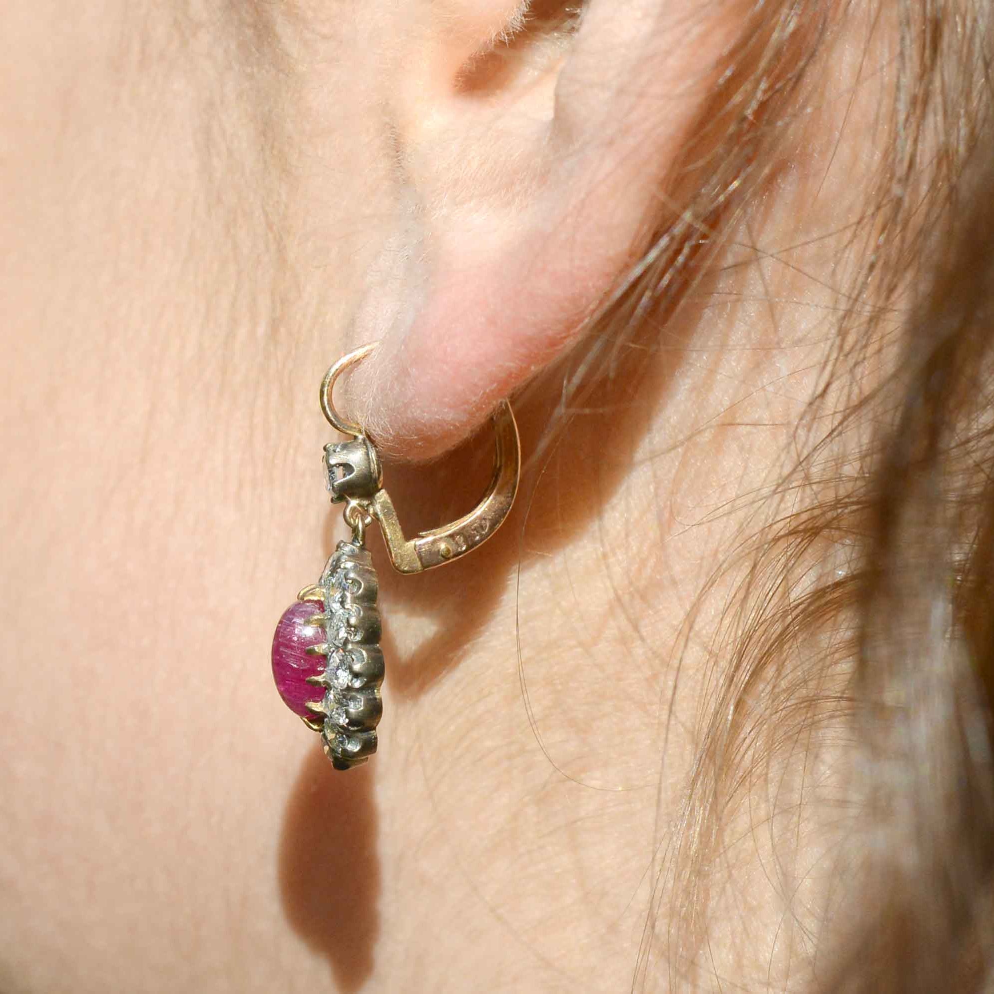 Stunning oval cabochon cut pigeon blood red rubies Edwardian earrings.