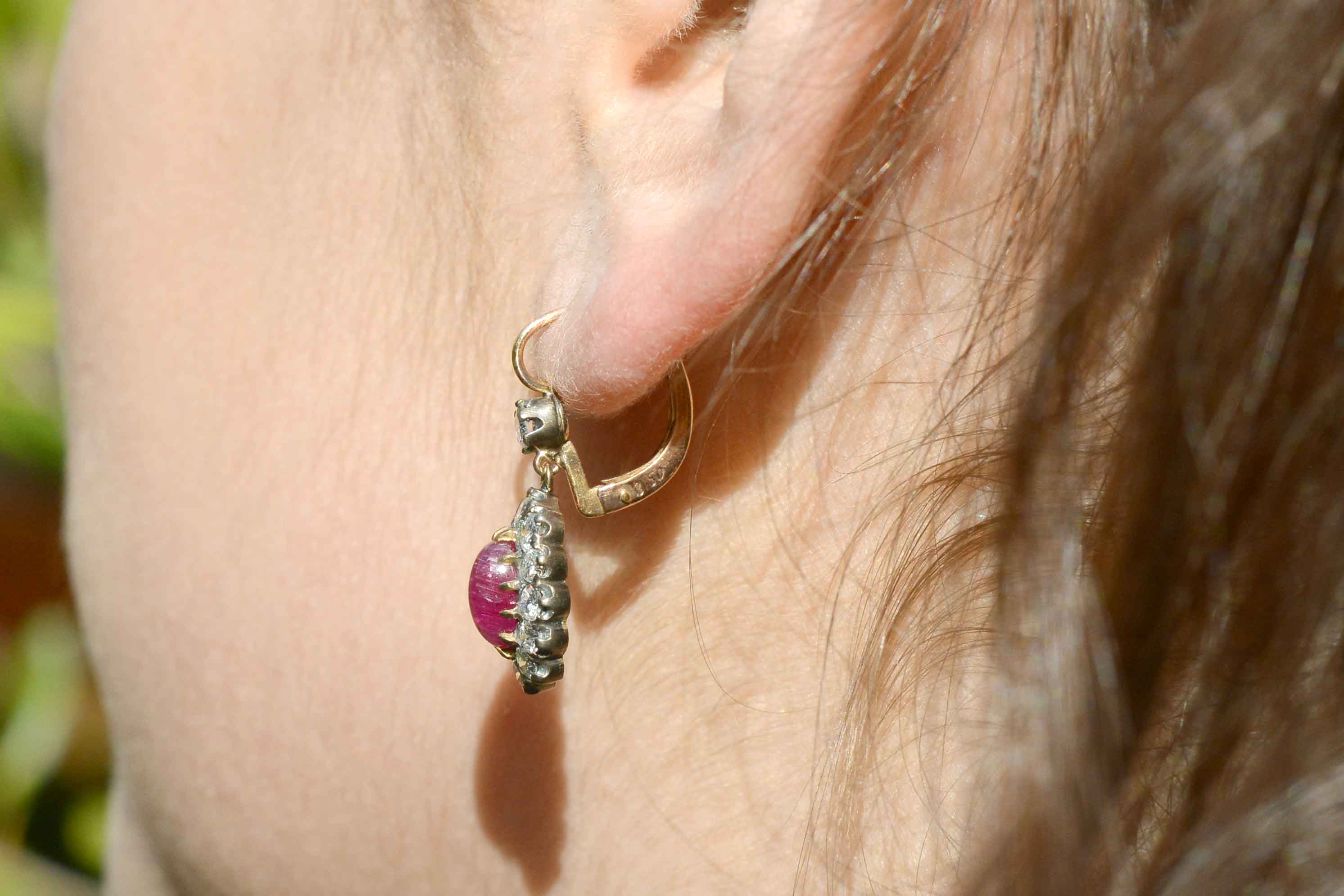 Stunning oval cabochon cut pigeon blood red rubies Edwardian earrings.