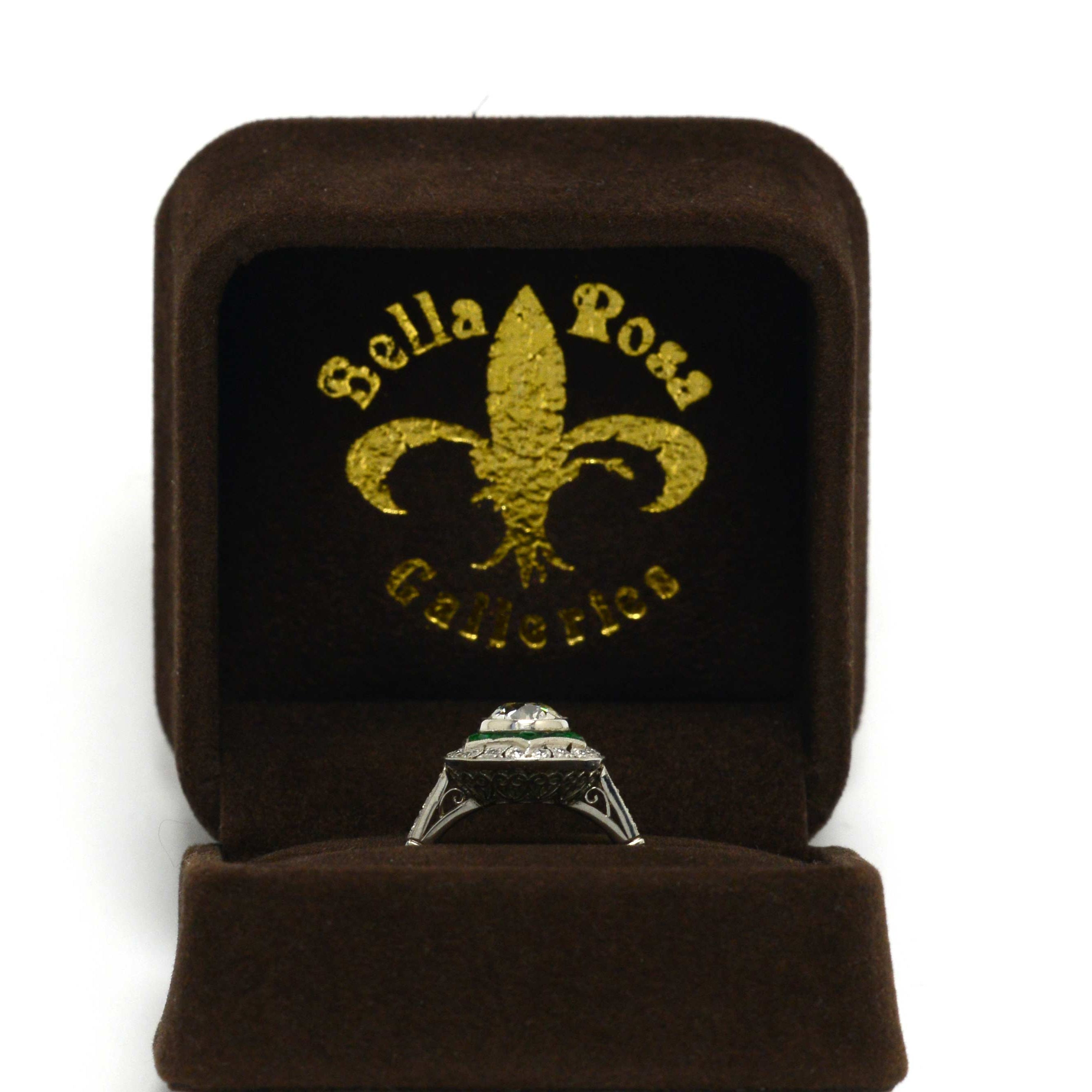 An Art Deco revival engagement ring displayed in our presentation box.