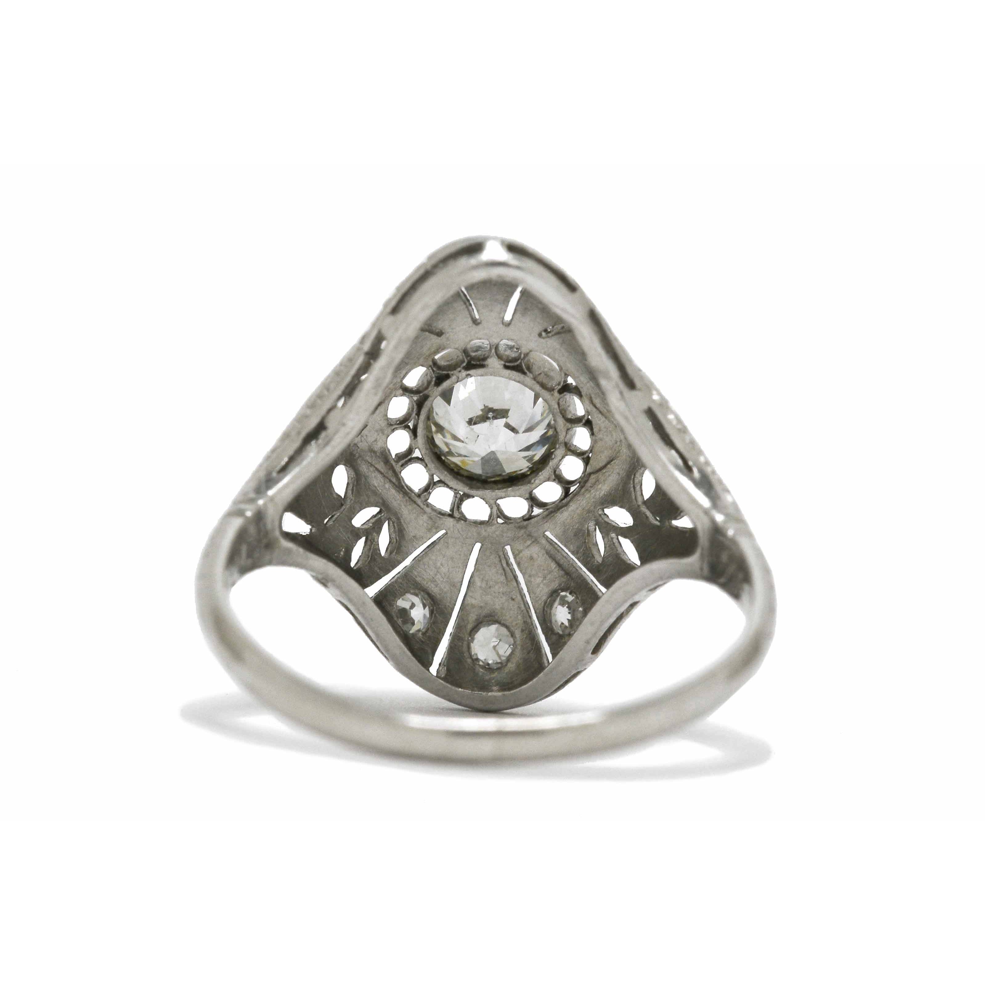 A classic antique filigree navette white gold ring design.