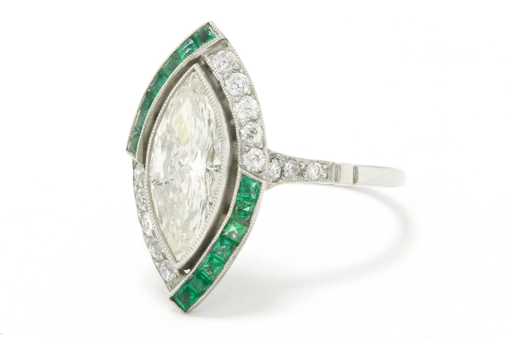 A 1 and 3/4 carat marquise cut diamond set in an Art Deco engagement ring.